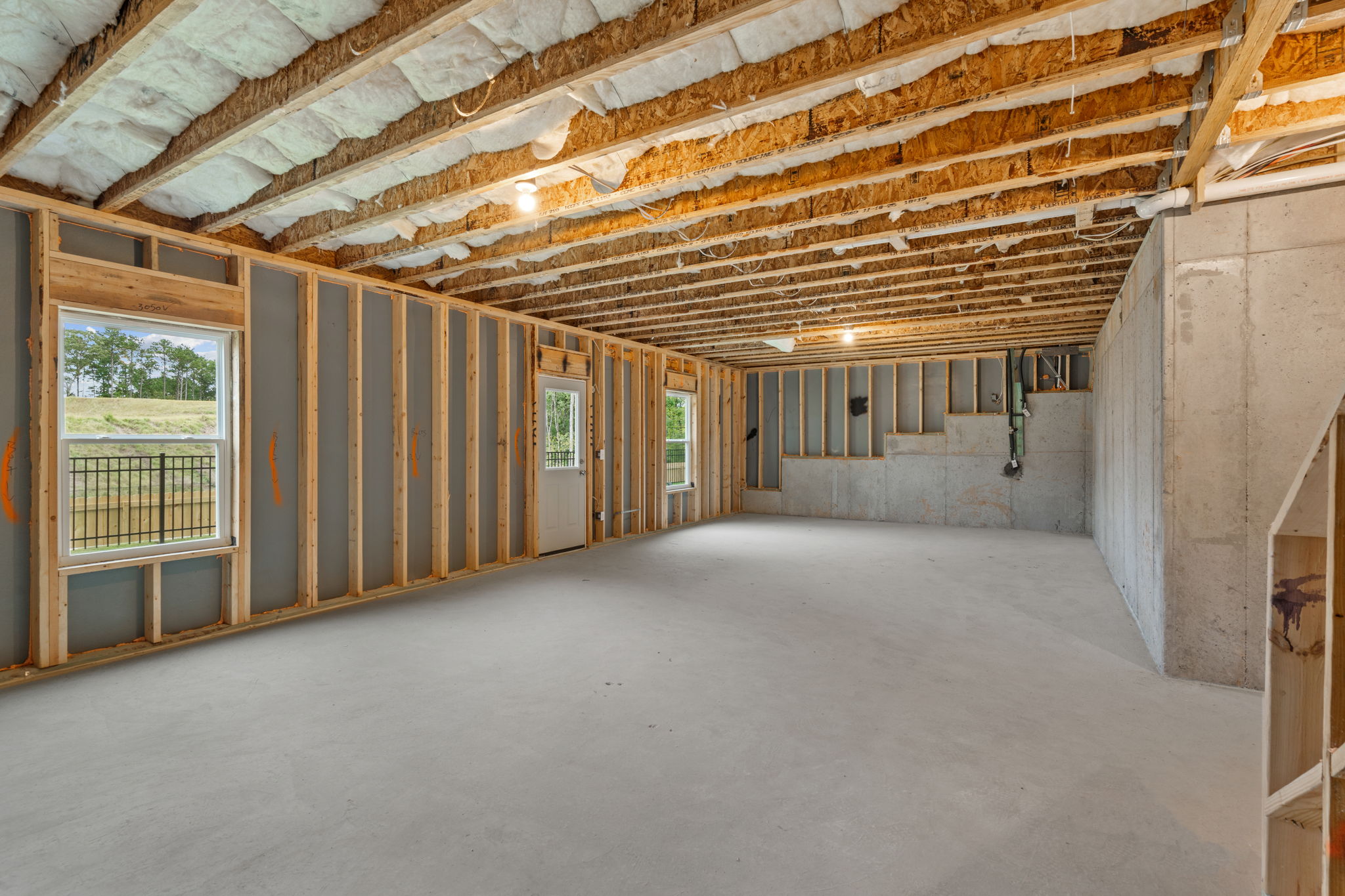 A room with a ceiling and windows.