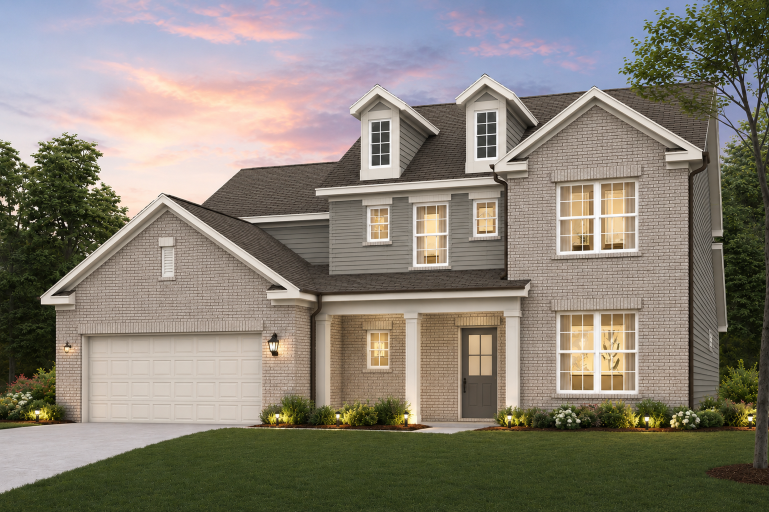 A house with a lawn in front.