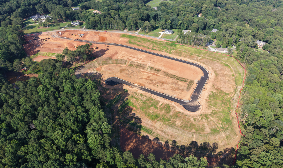 A large dam in a forest.