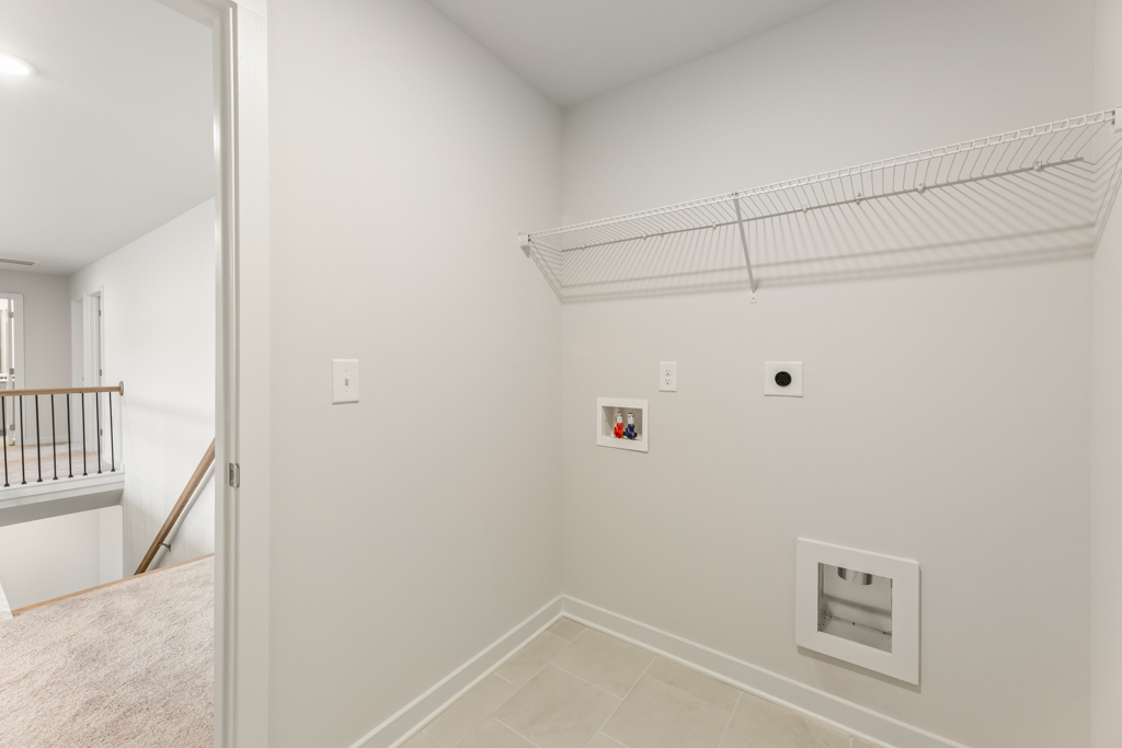 A white room with a white wall.