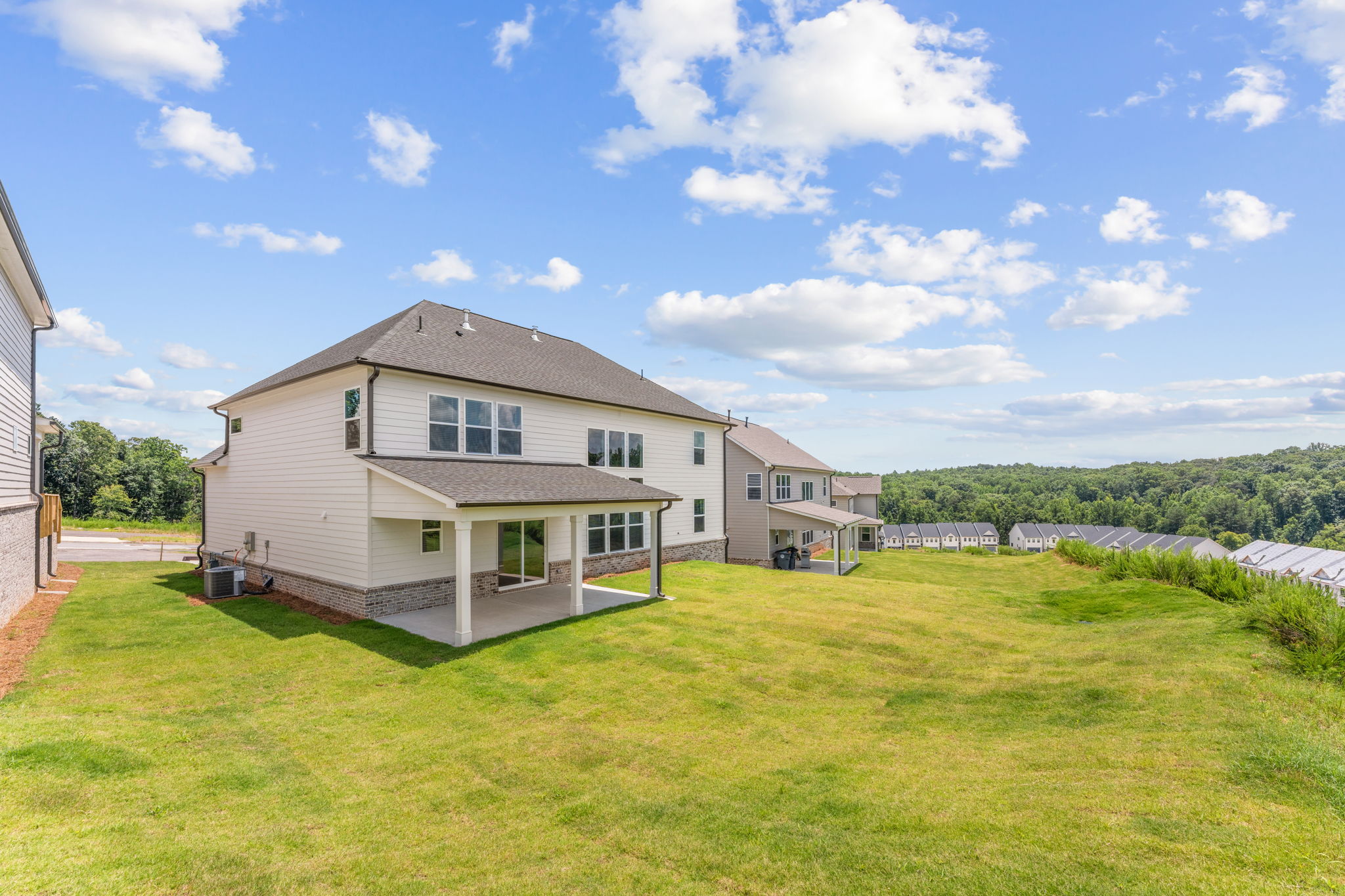 A house with a large lawn.