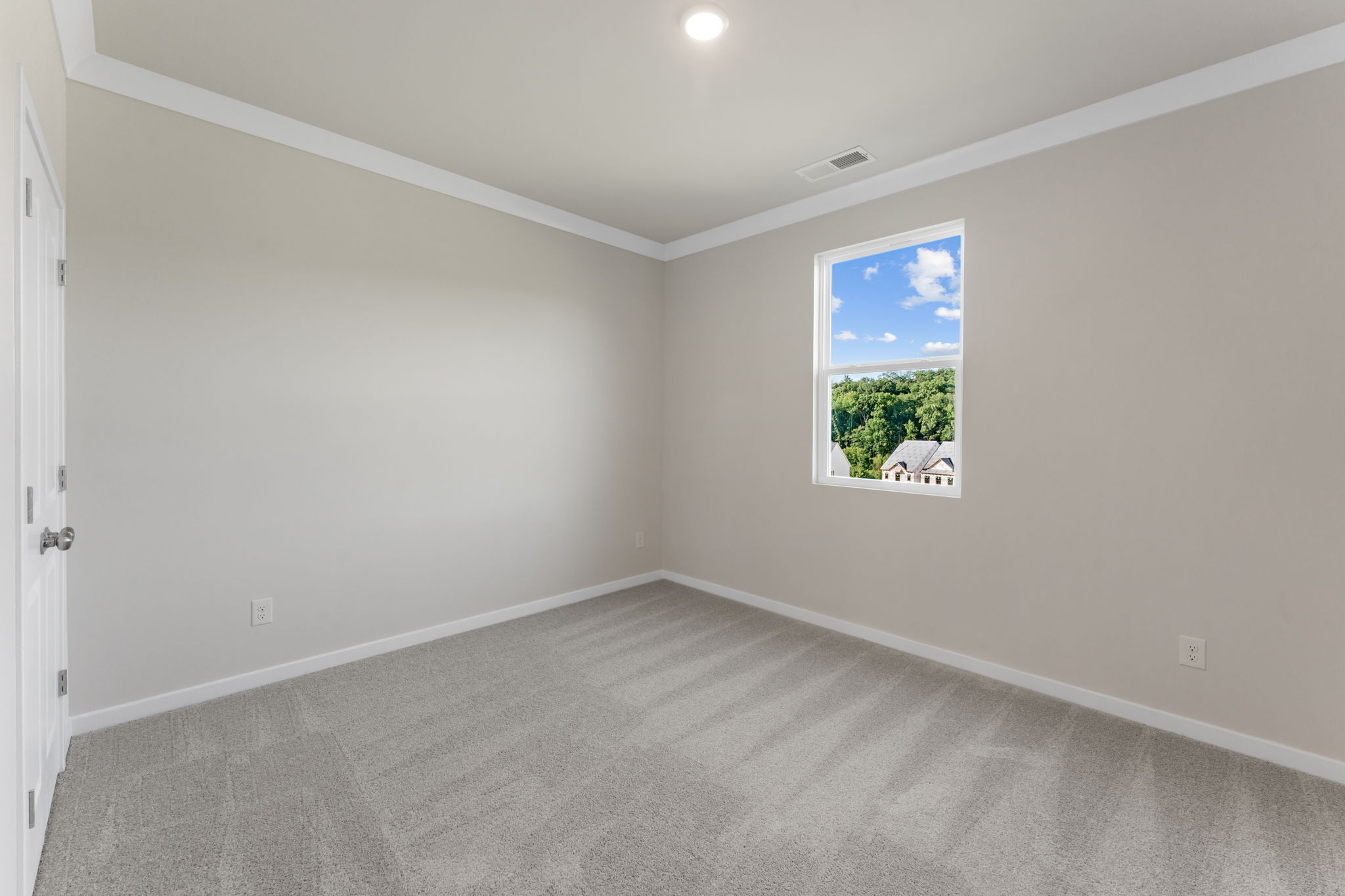 A room with a large window.