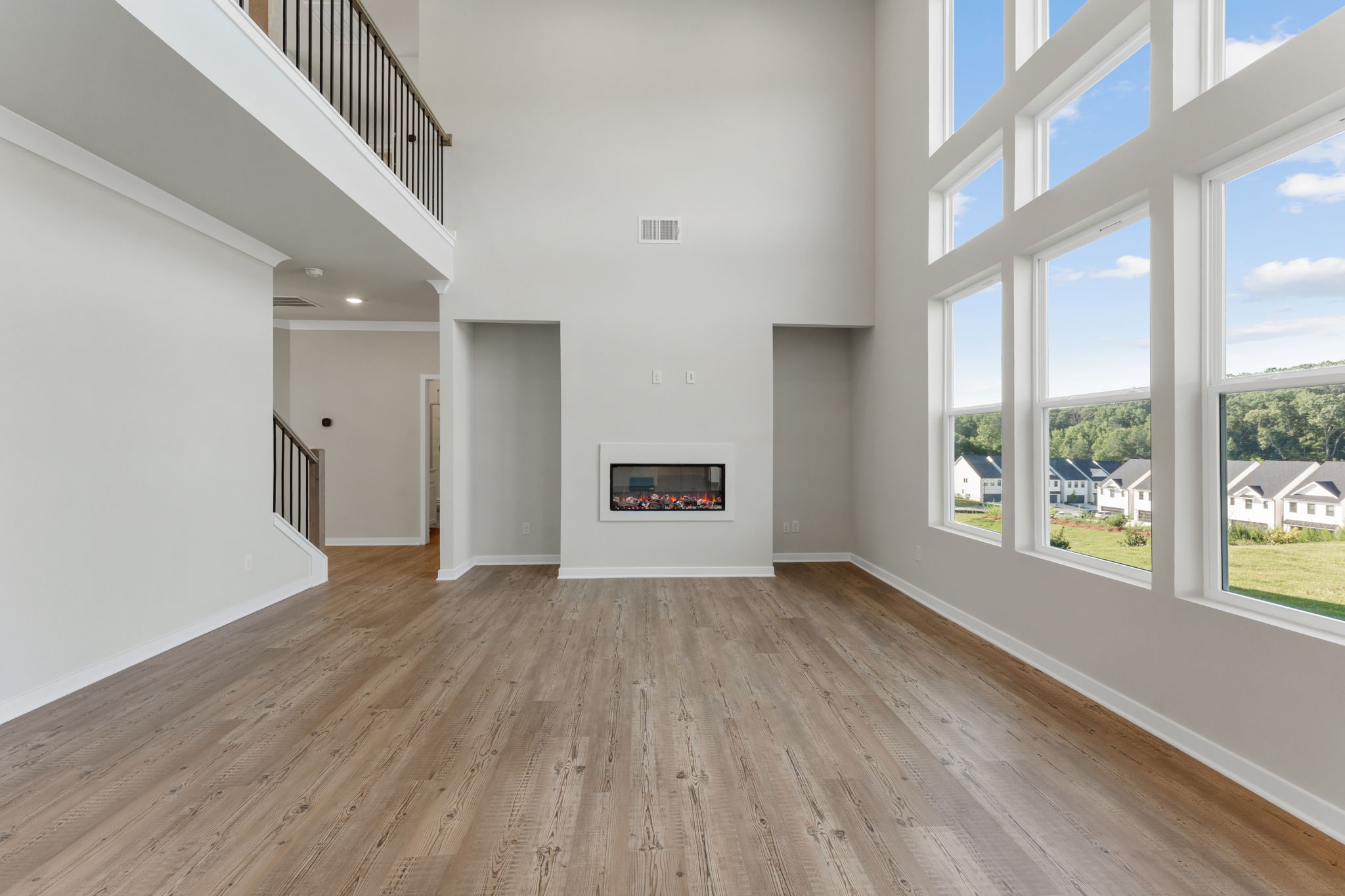 A room with a wood floor and a wood floor.