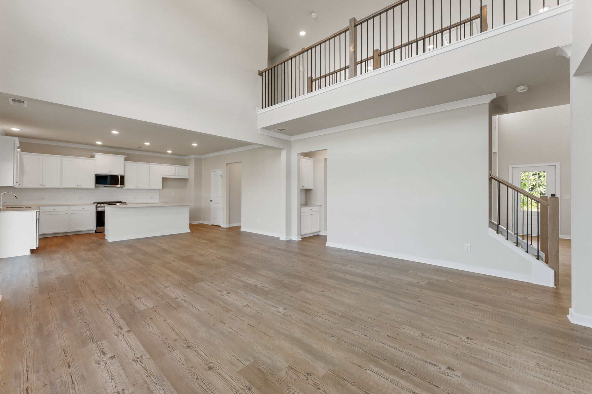 A large empty room with white walls.