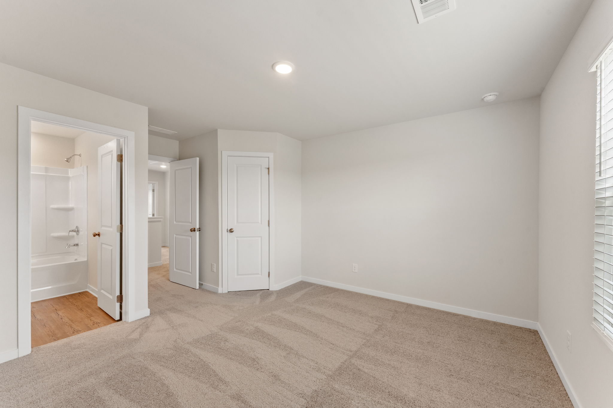 A room with white doors.
