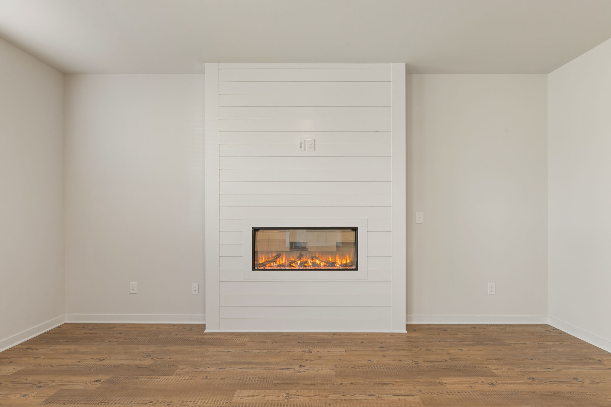 A fireplace in a room.