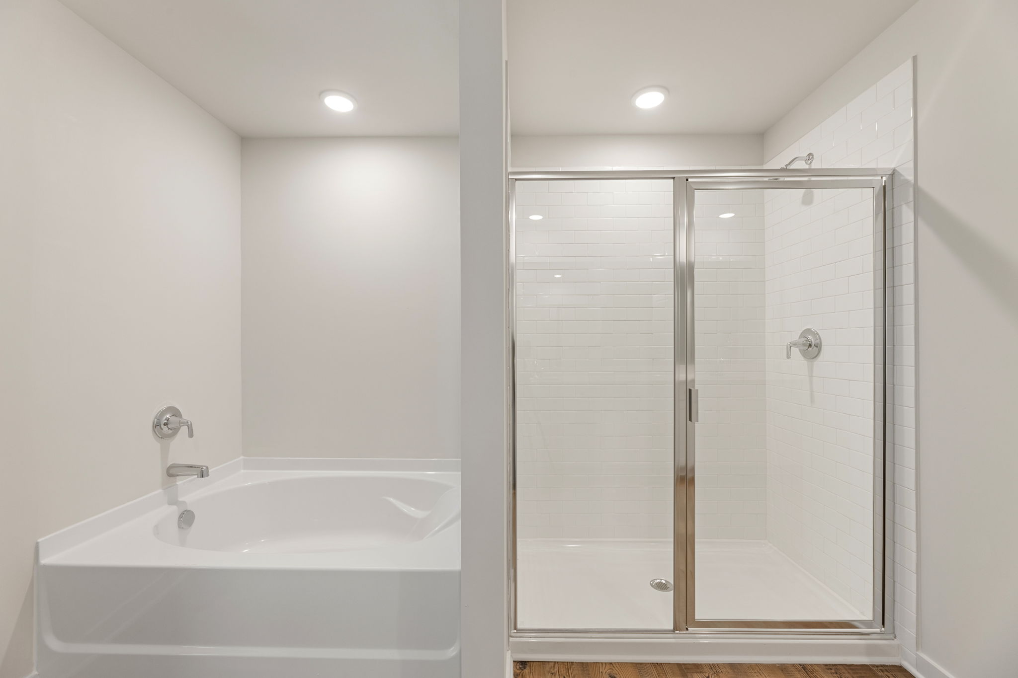 A bathroom with a glass shower.