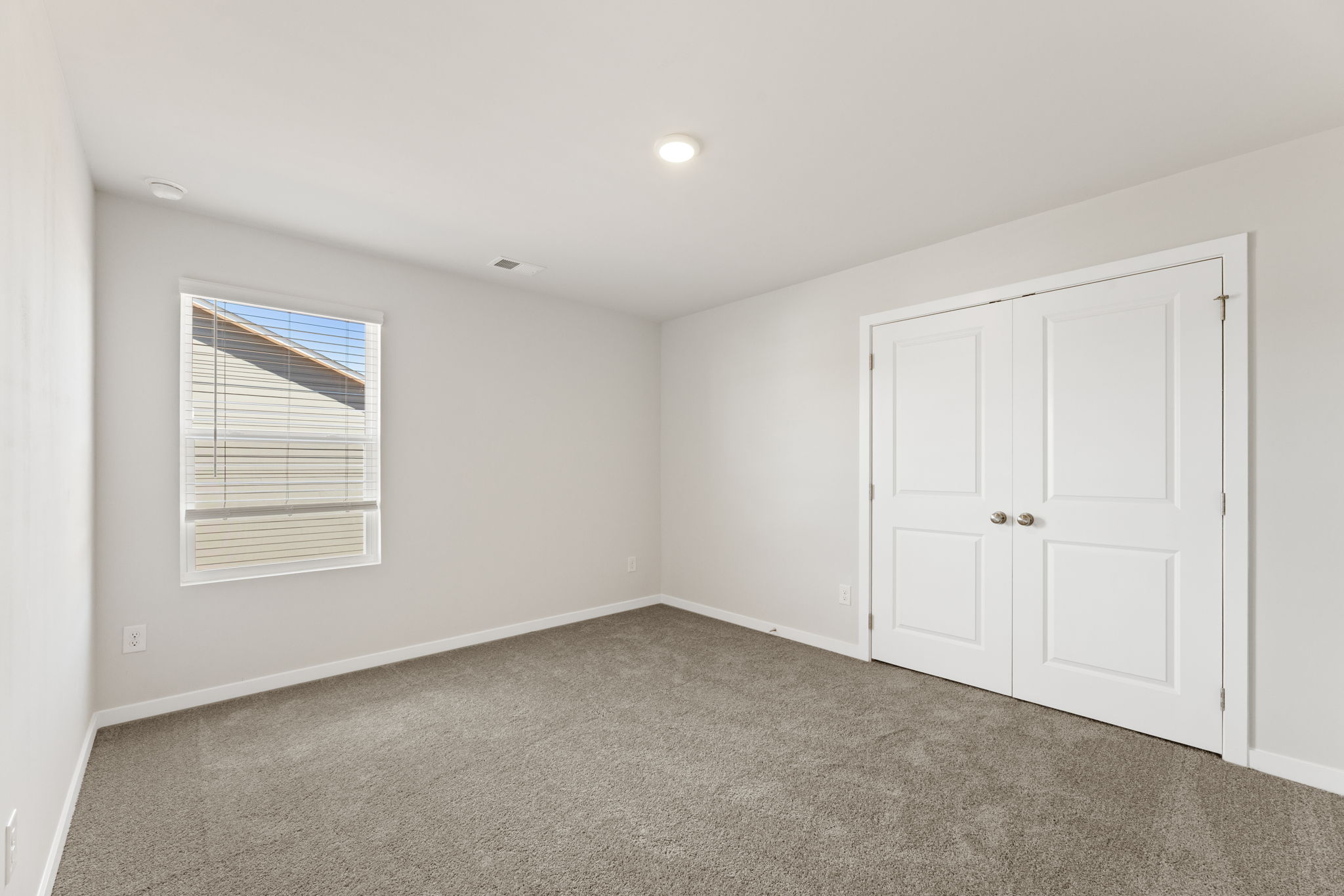 A room with white doors.