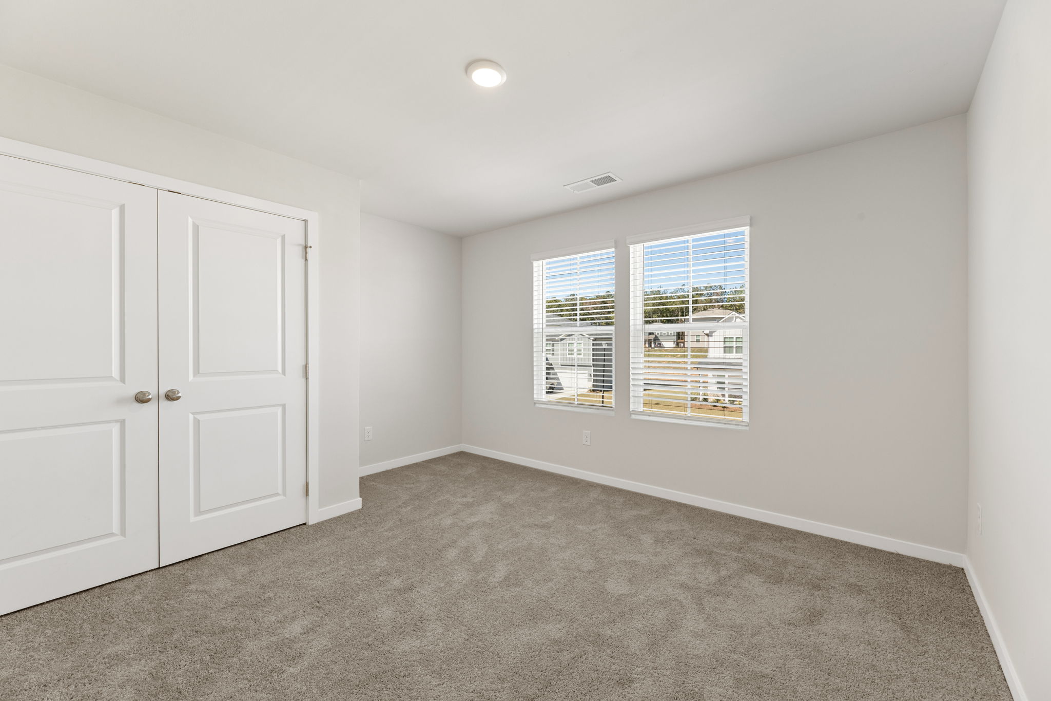 A room with white doors.