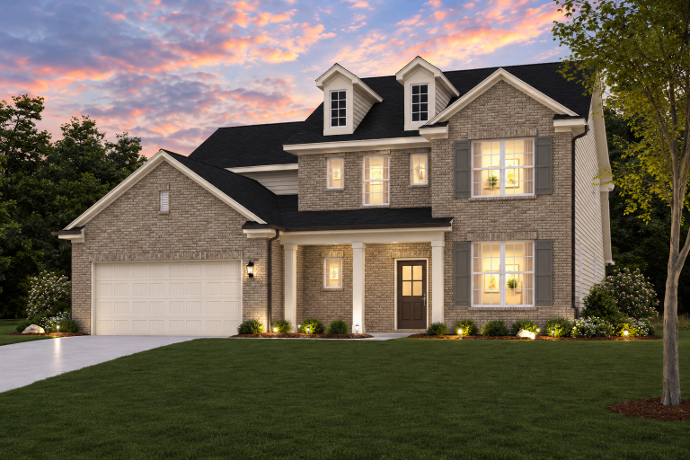 A house with a large front yard.