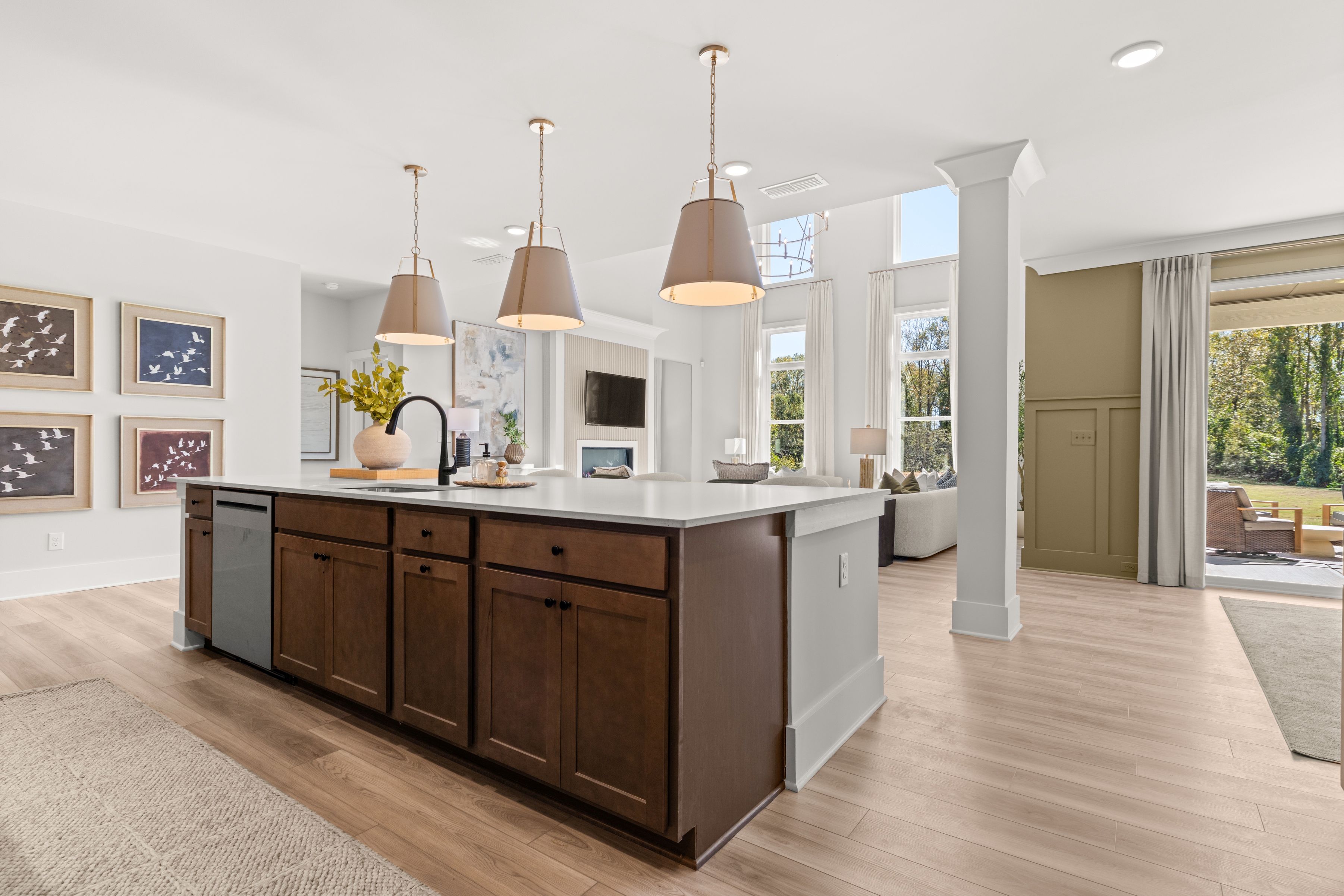 A kitchen with a marble island.