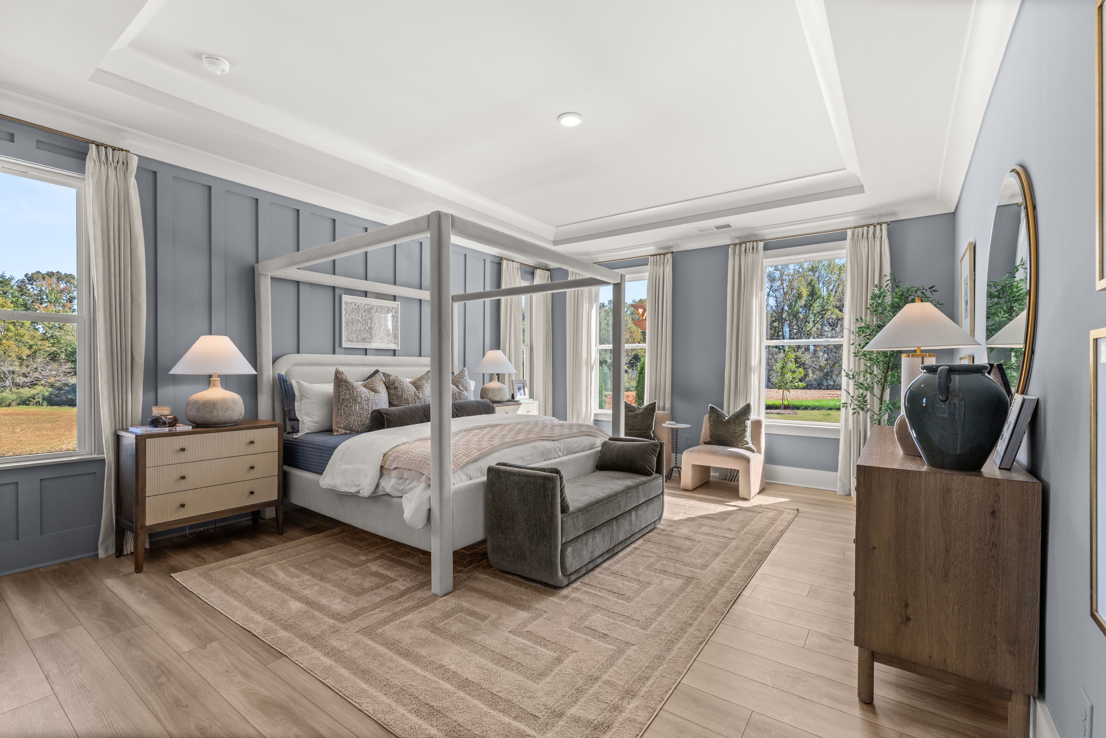 A bedroom with a large bed.