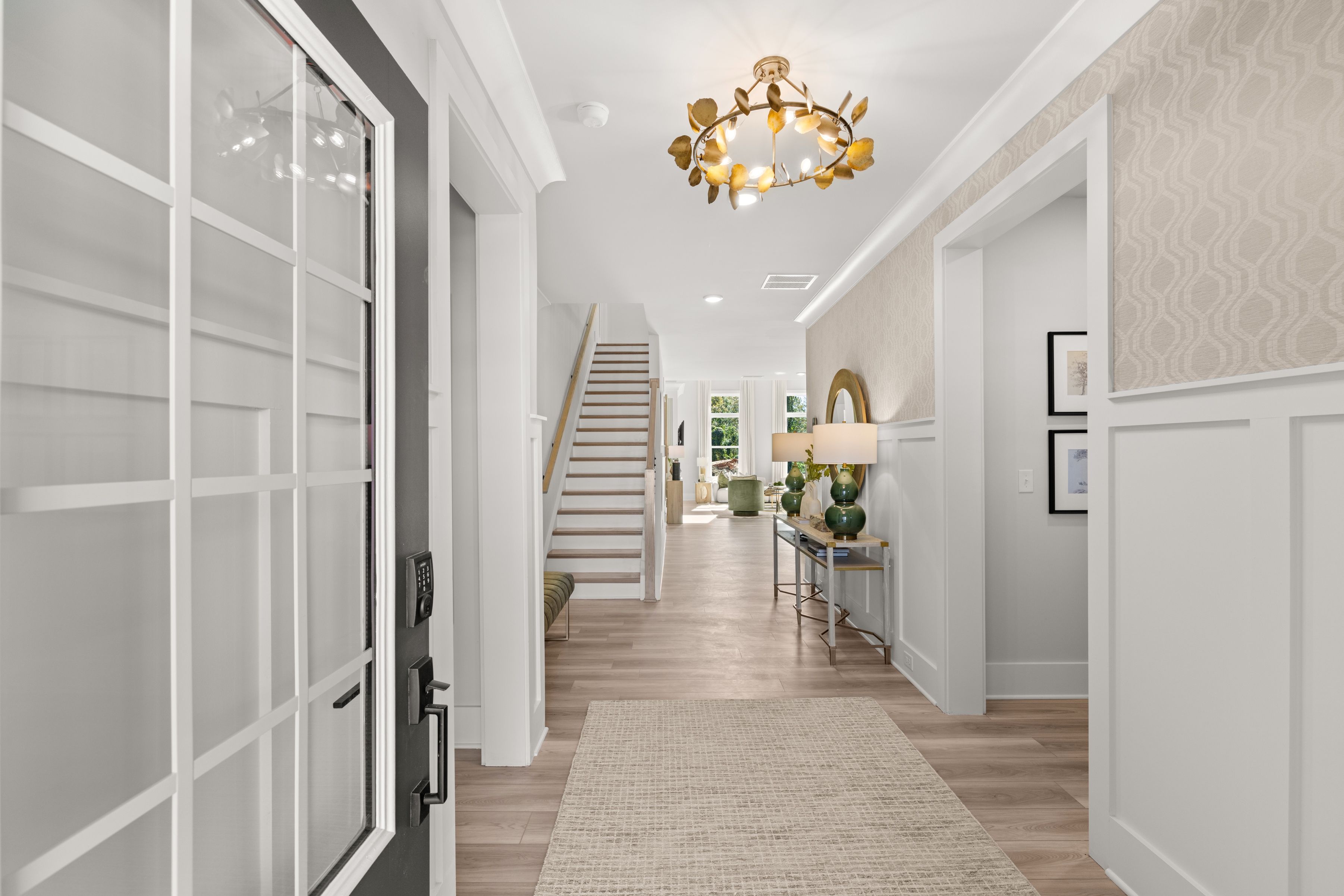A hallway with white walls.