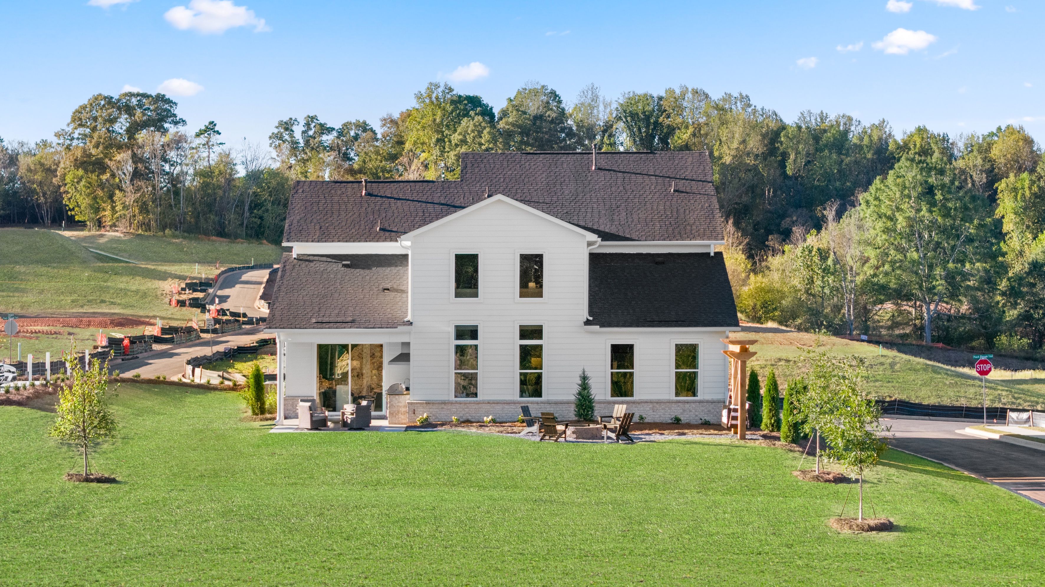 A house with a lawn and trees.
