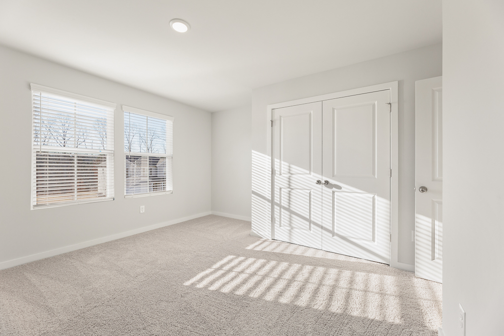 A room with white doors.