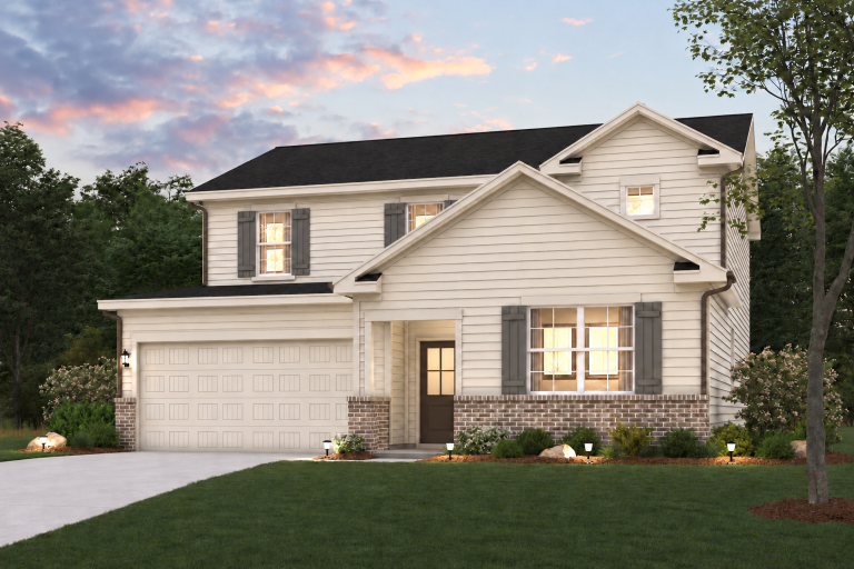 A house with a lawn in front.