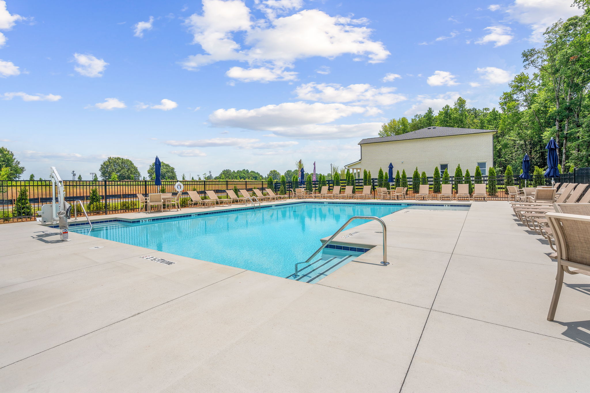 A pool with a fence around it.