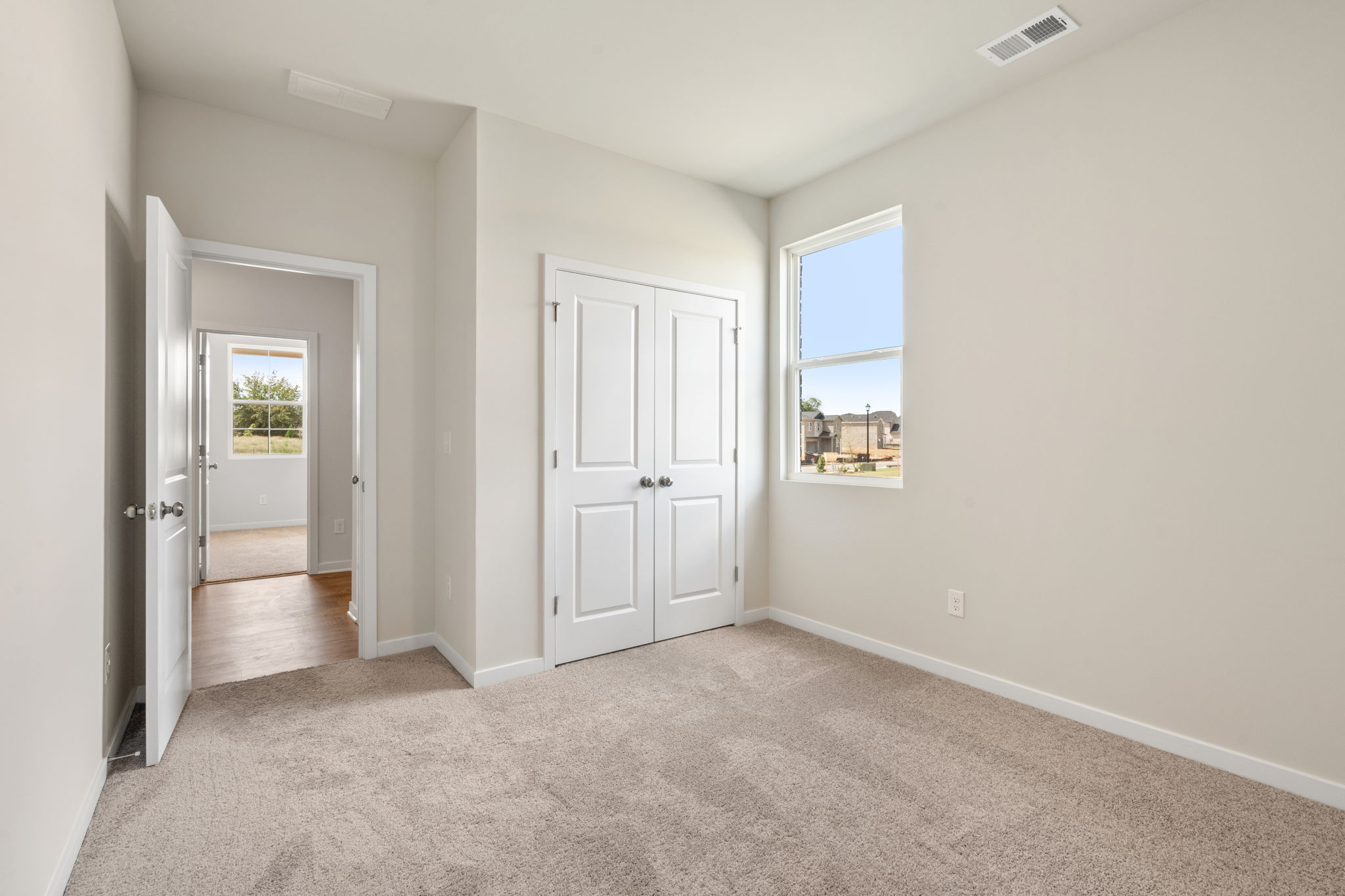 A room with white doors.