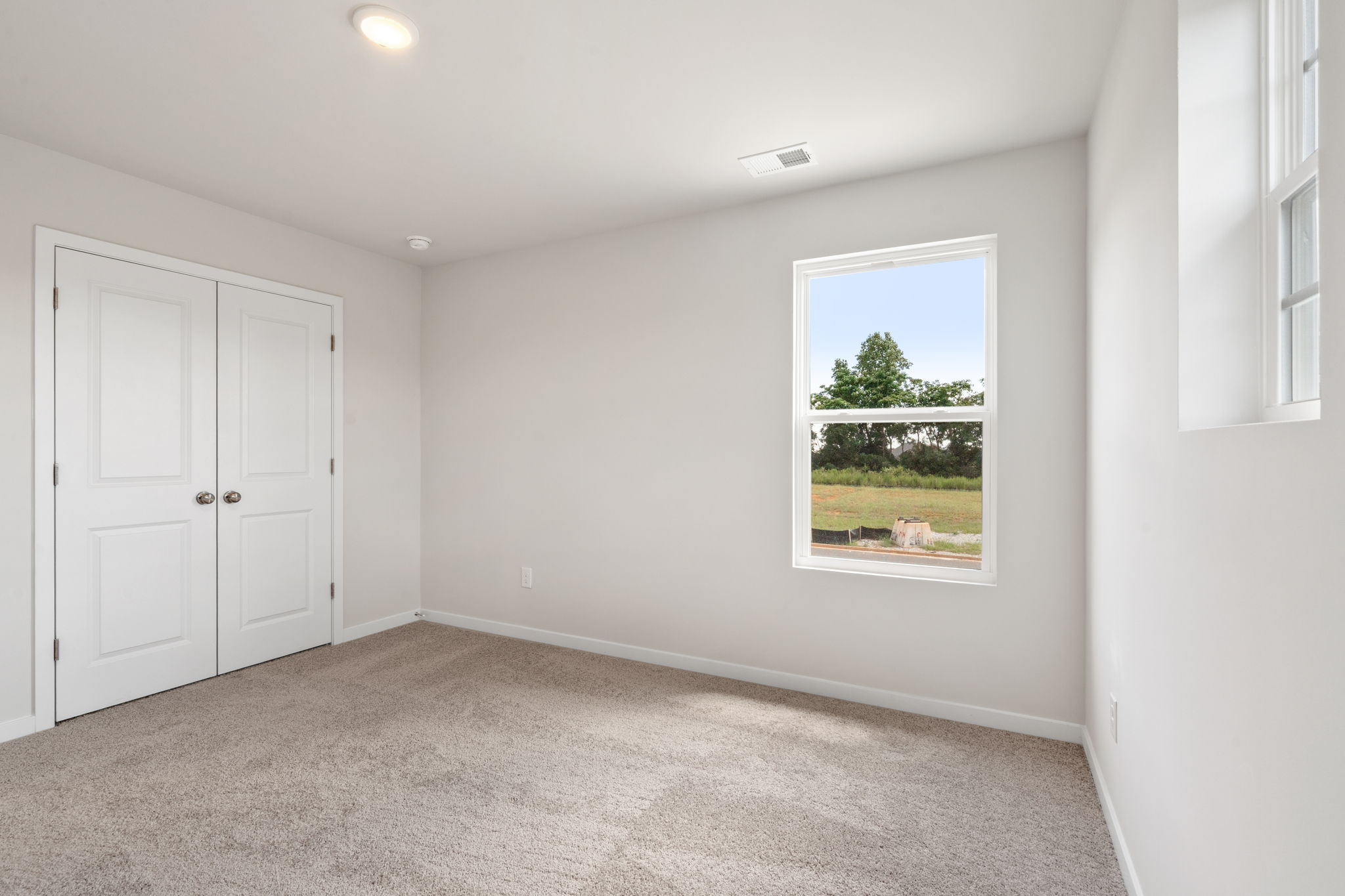 A room with white doors.