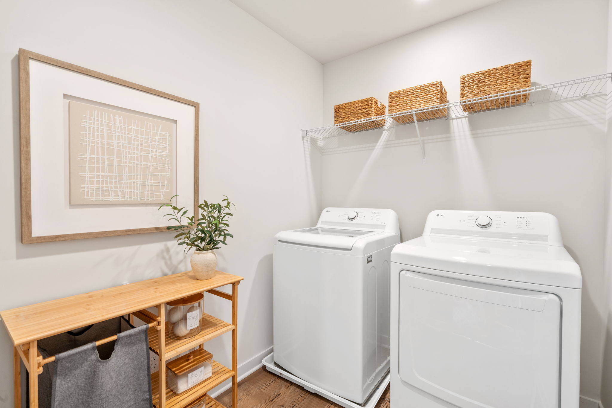 A room with a table and a white machine.