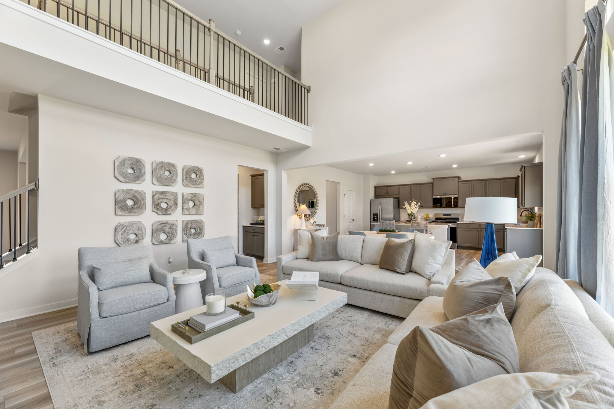 A living room with a couch and a table.