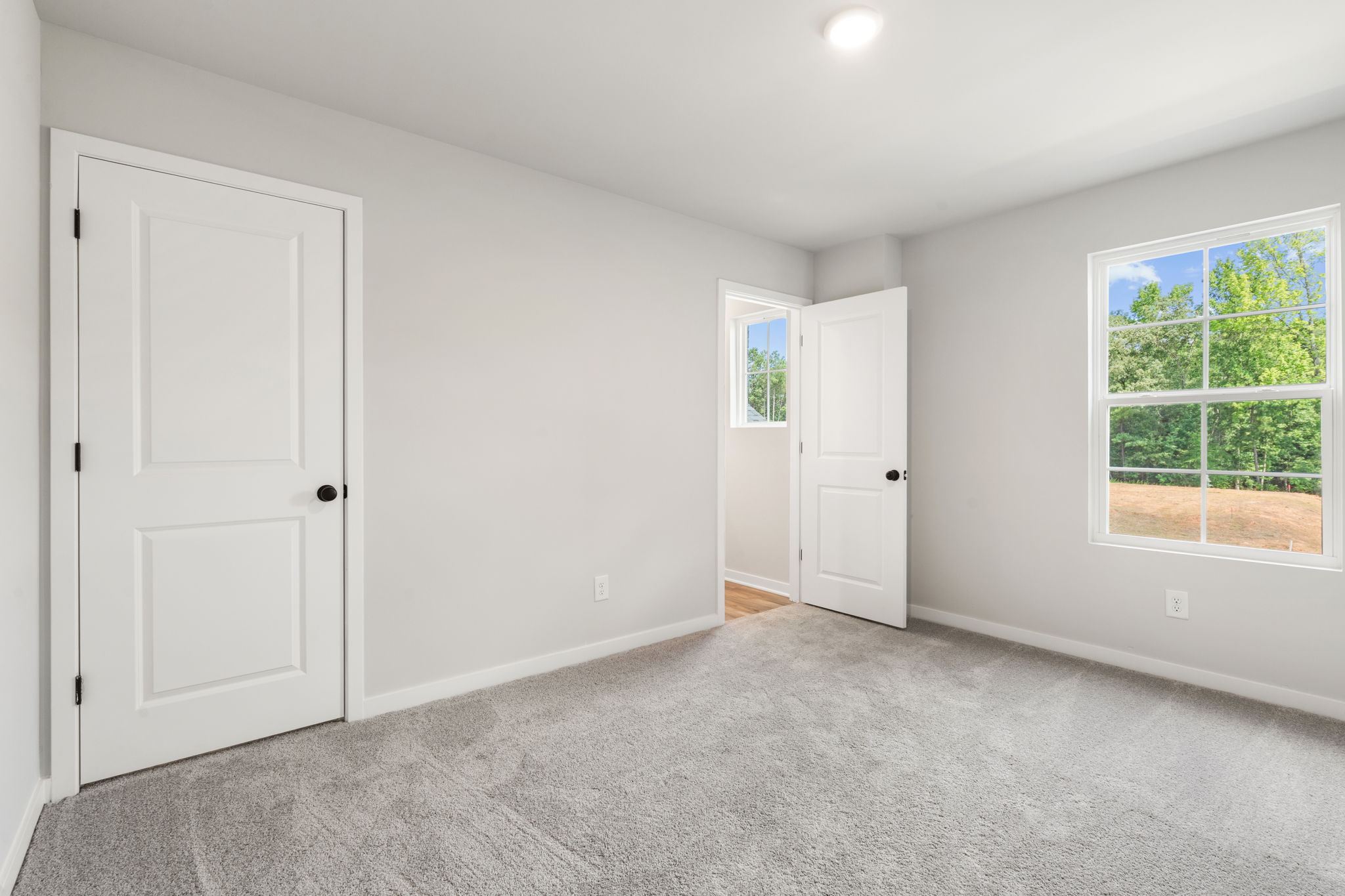 A room with white doors.