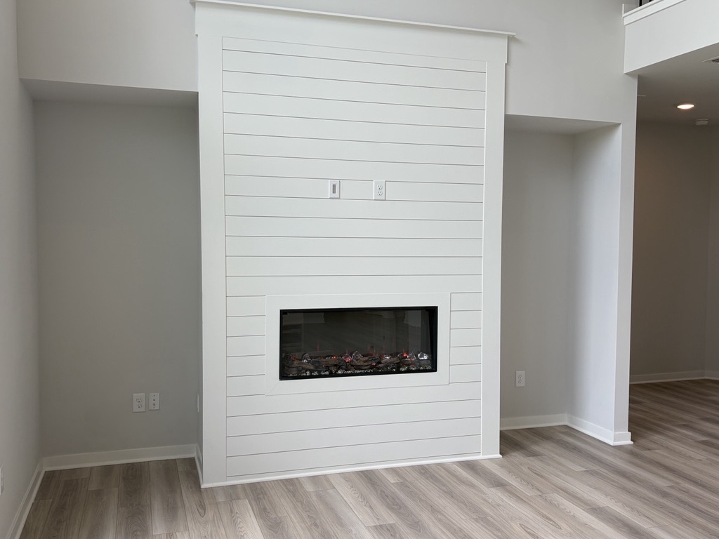 A fireplace in a room.