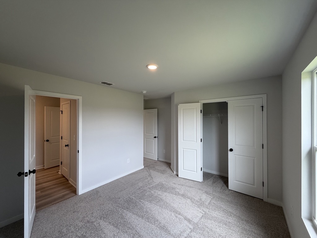 A room with white doors.