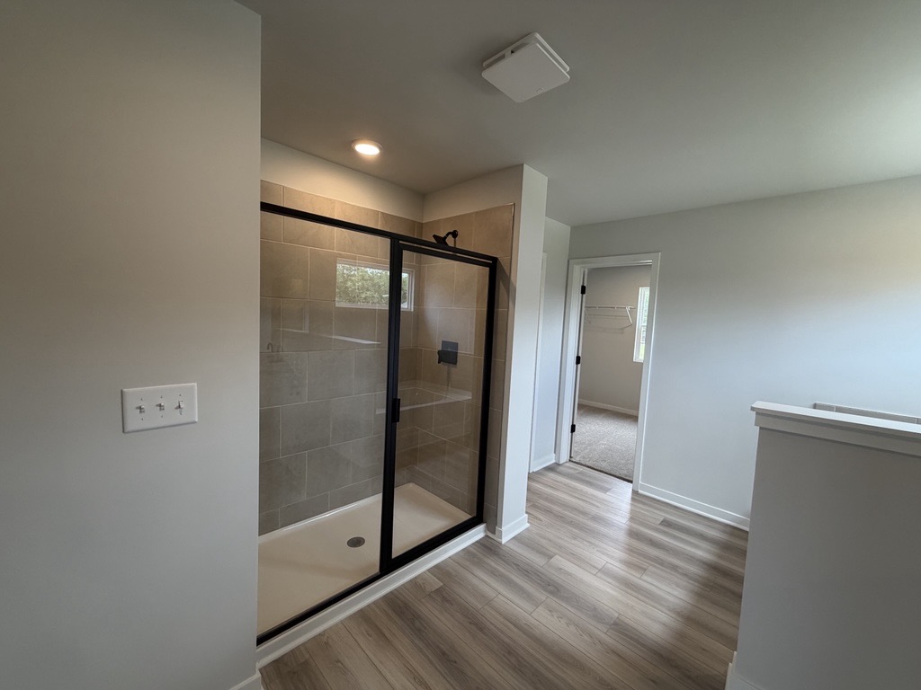 A room with a glass door.