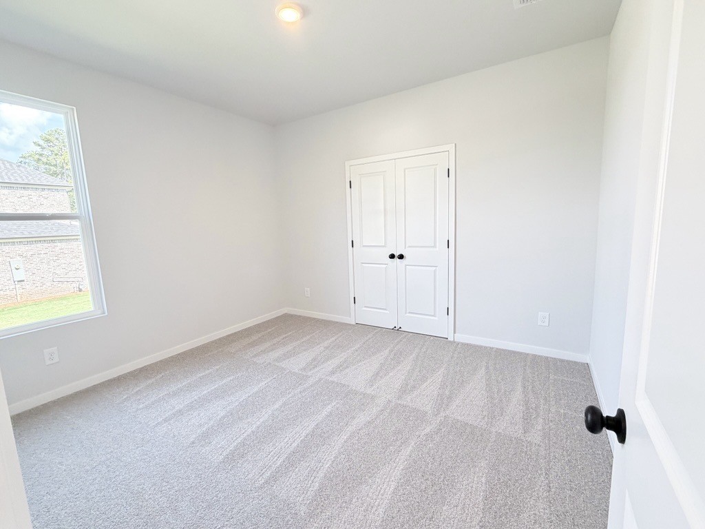 A room with white doors.