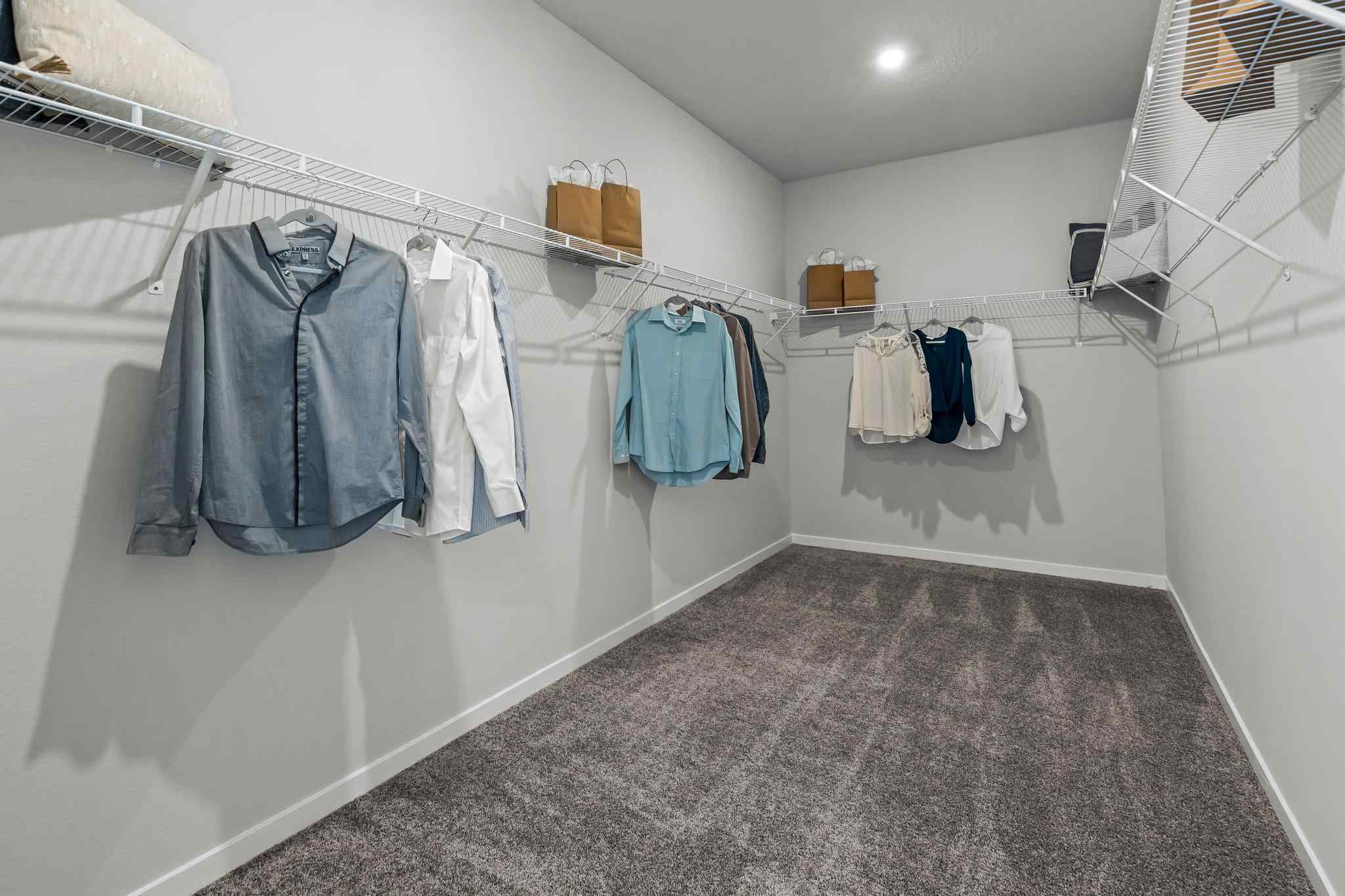 A room with a white wall and a white wall with a white wall with a white wall with.