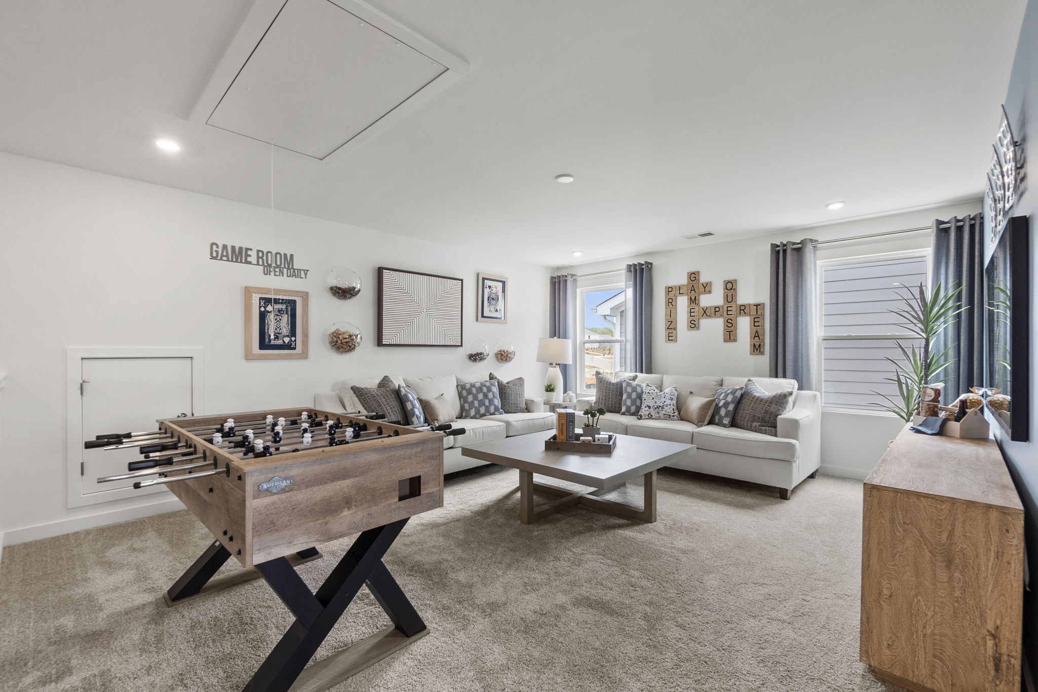 A living room with a couch and coffee table.