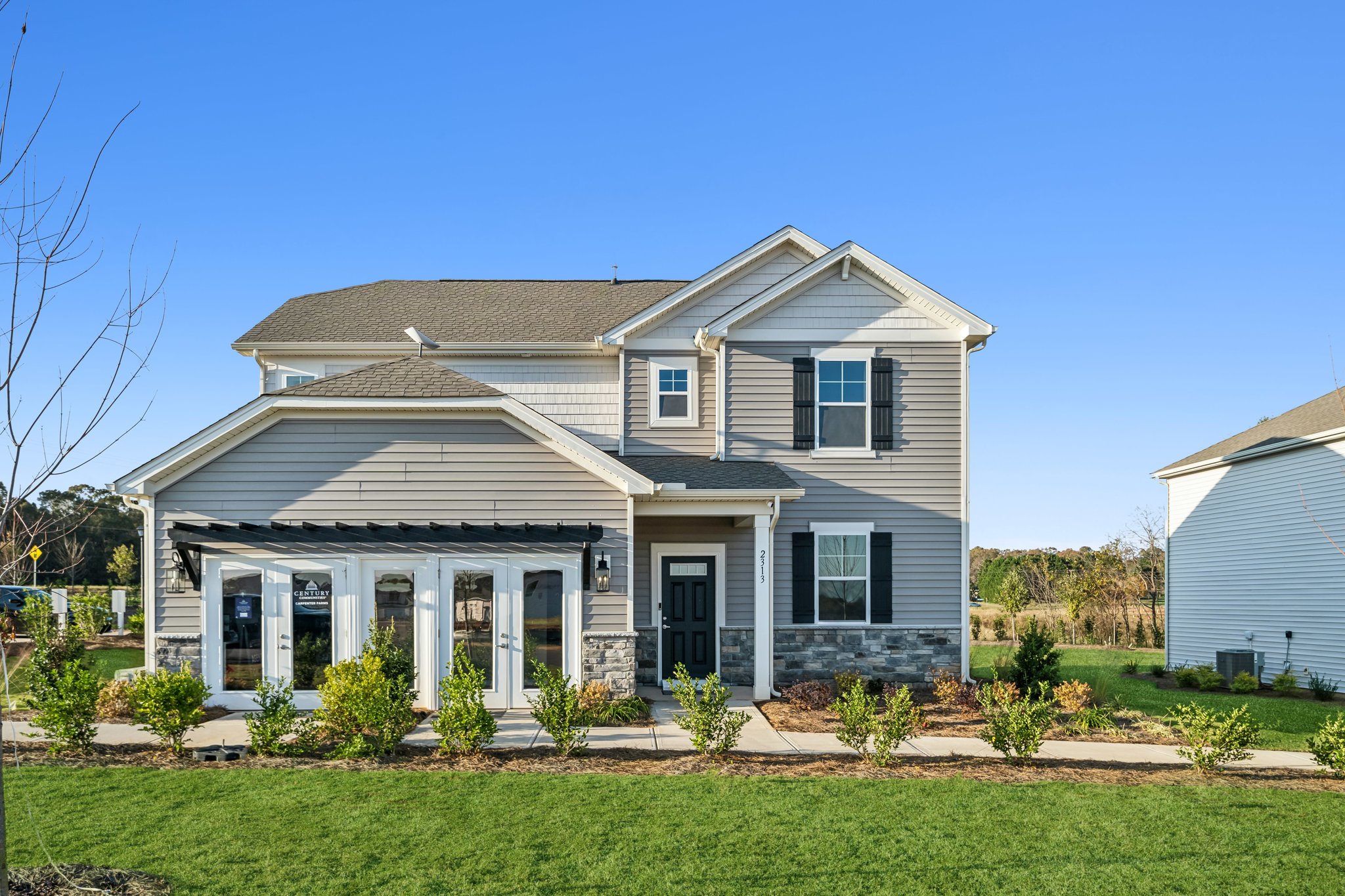 A house with a large front yard.