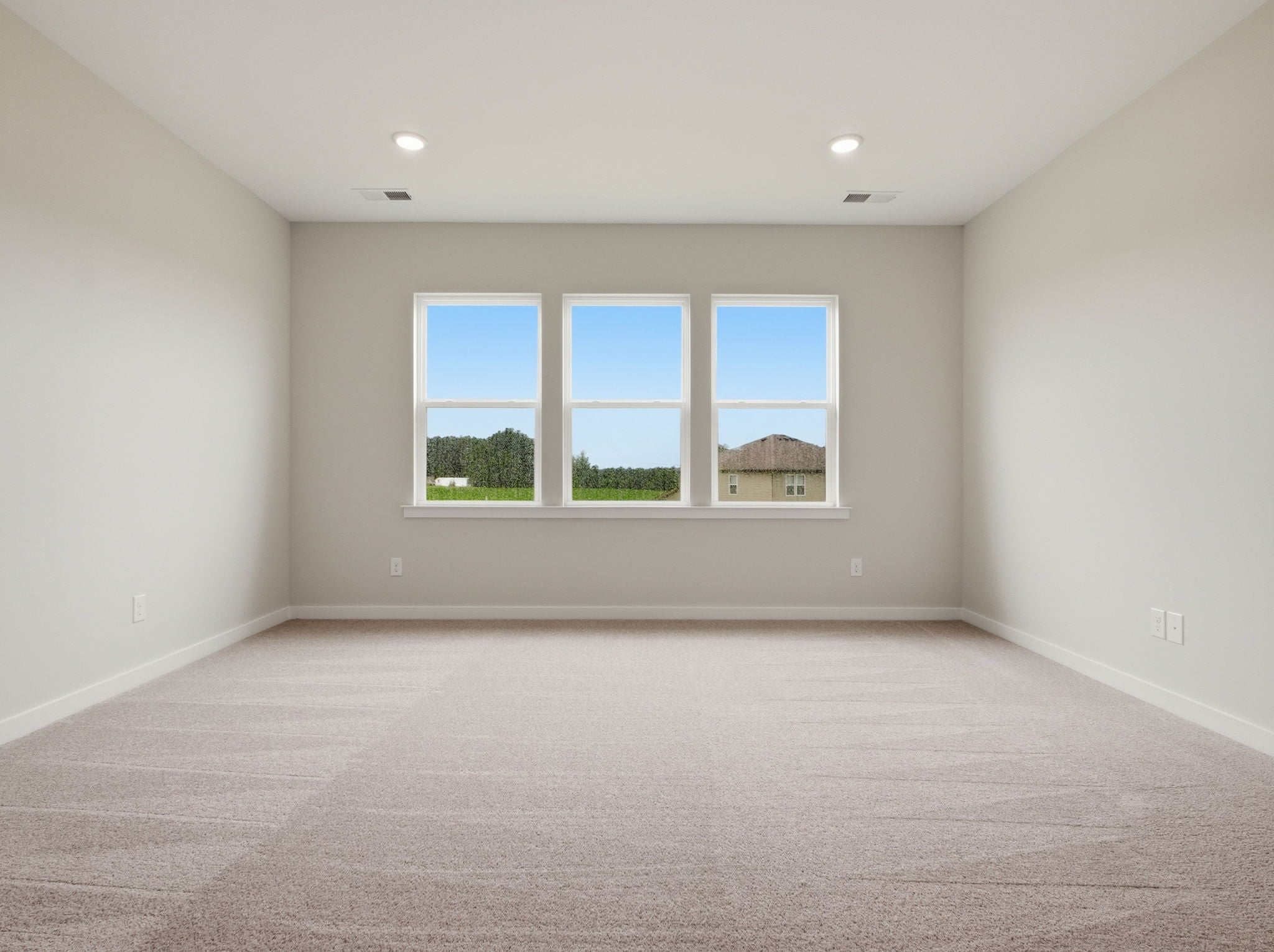 A room with a large window.