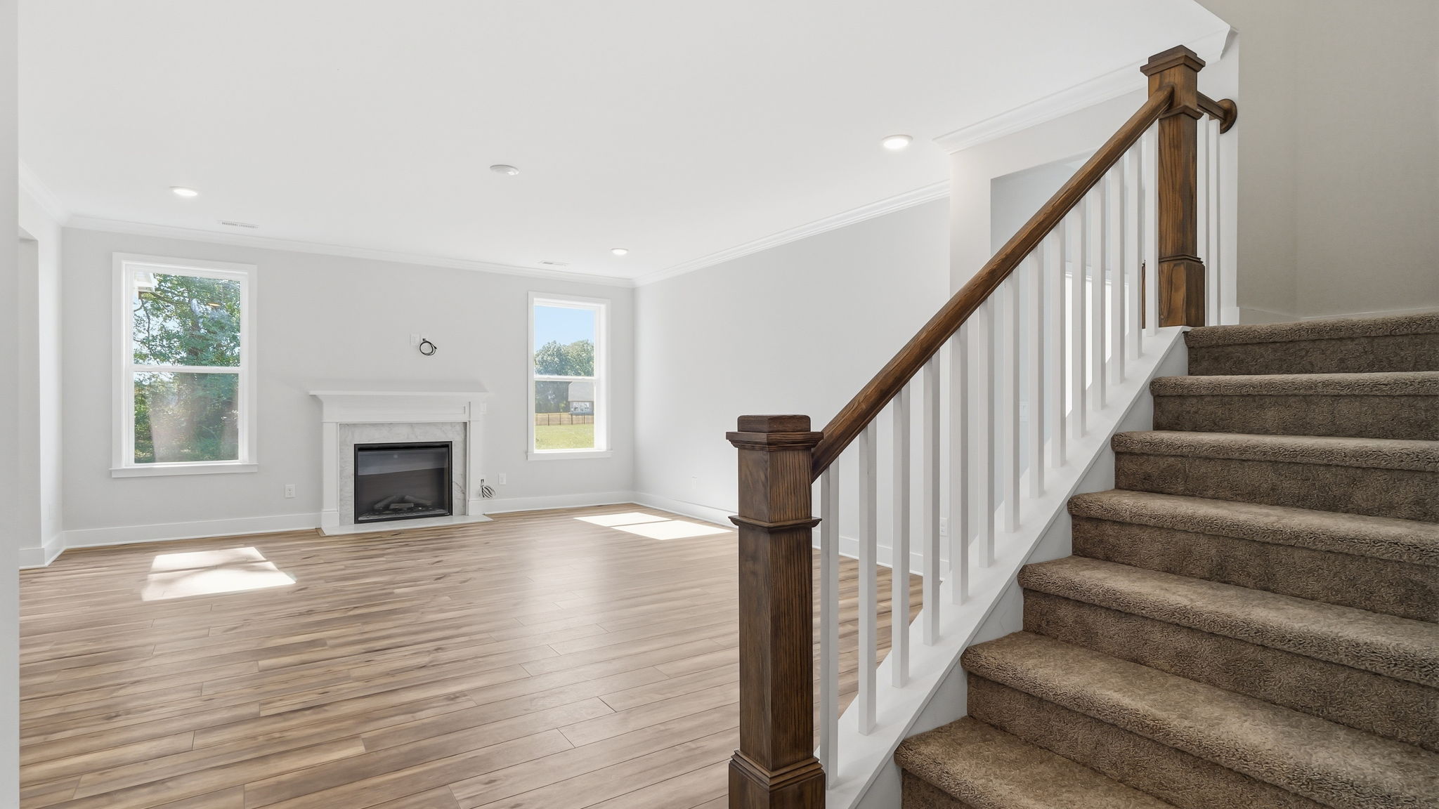 A staircase leading to a fireplace.