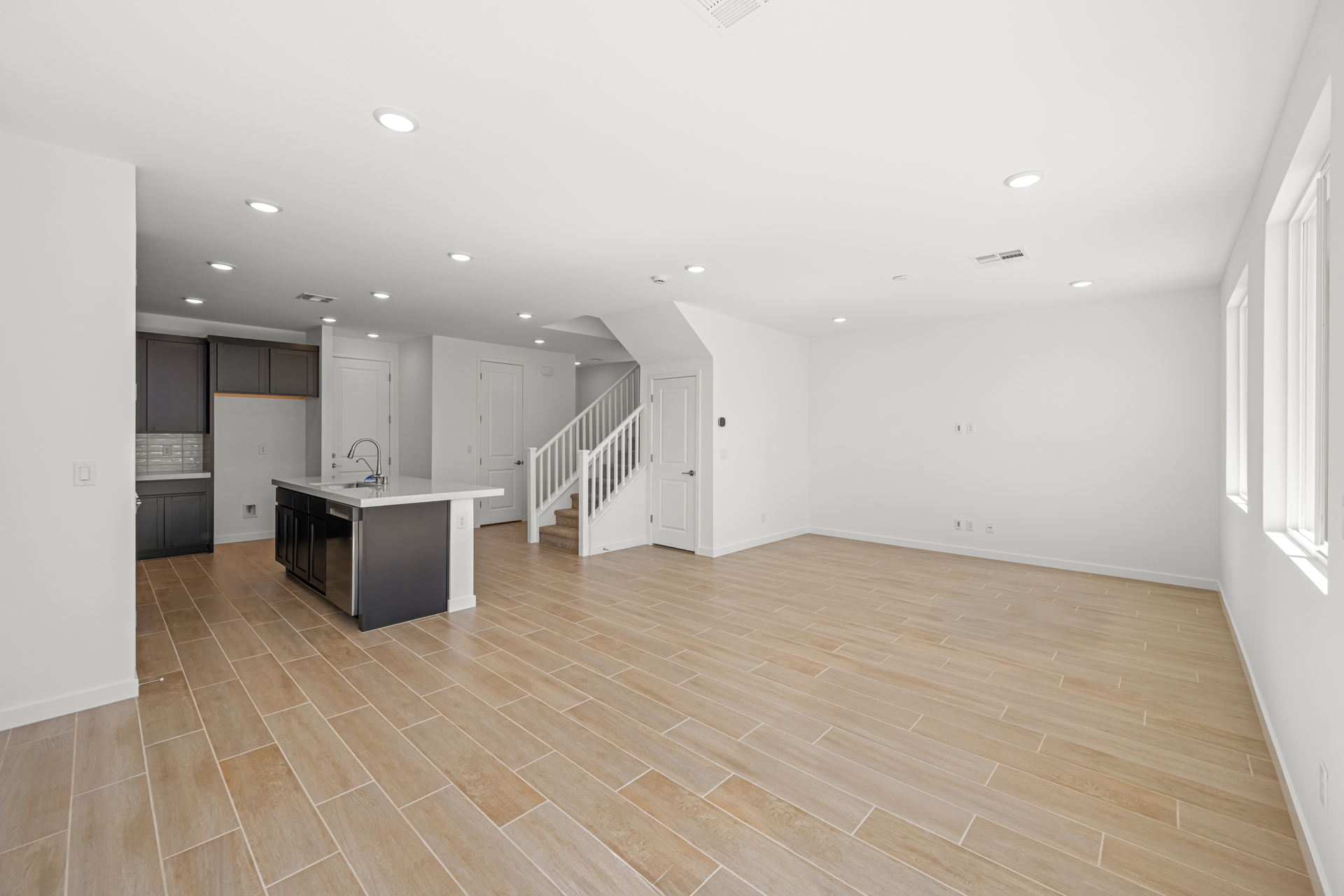 A large empty room with white walls.