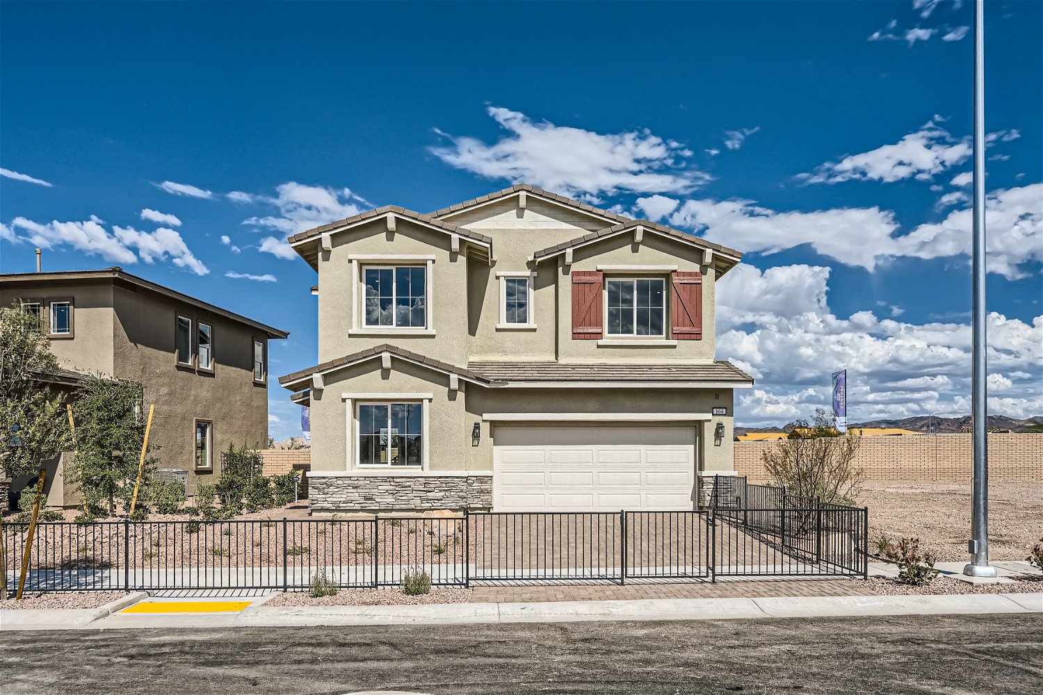 A house with a fence around it.