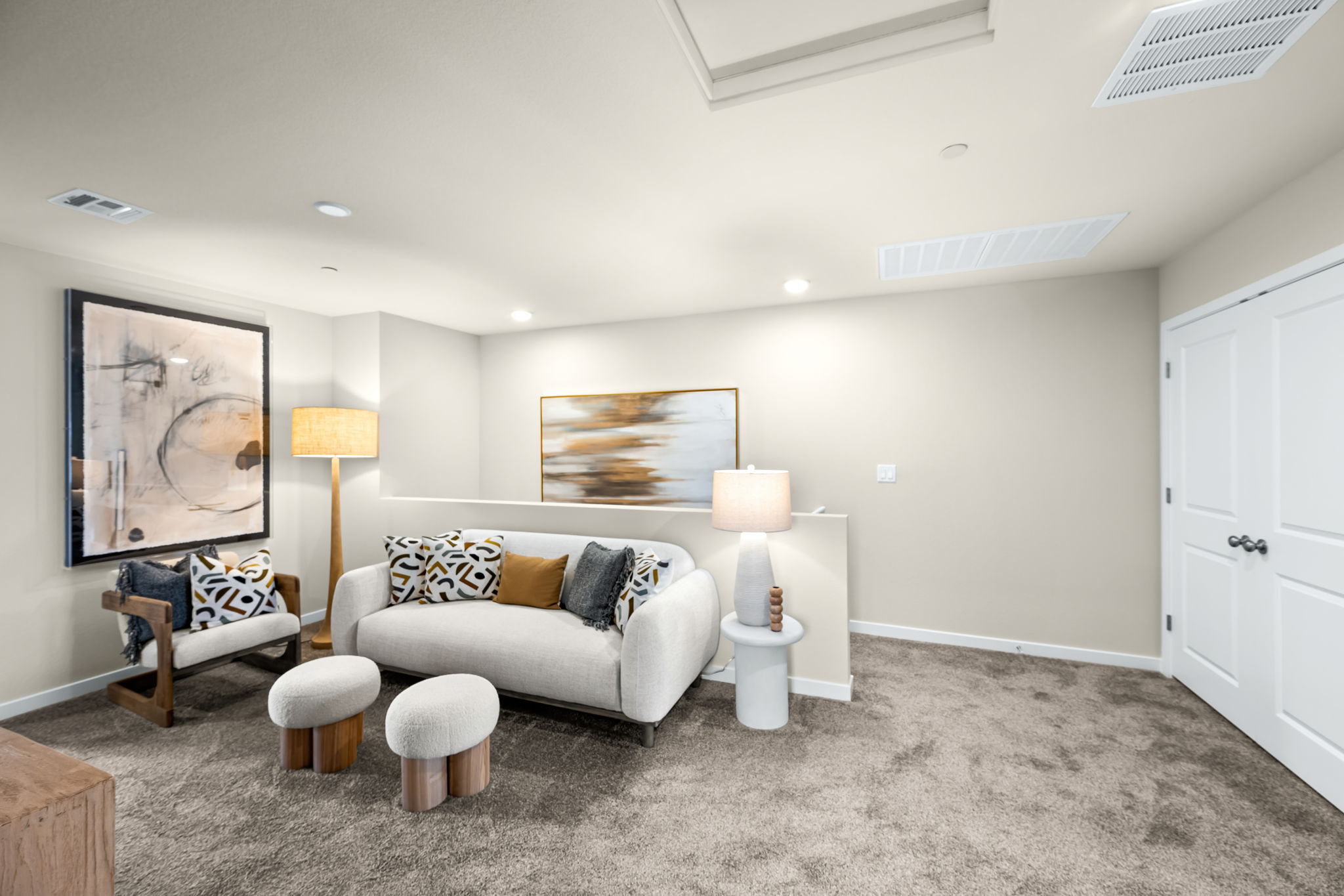 A living room with a couch and a table.