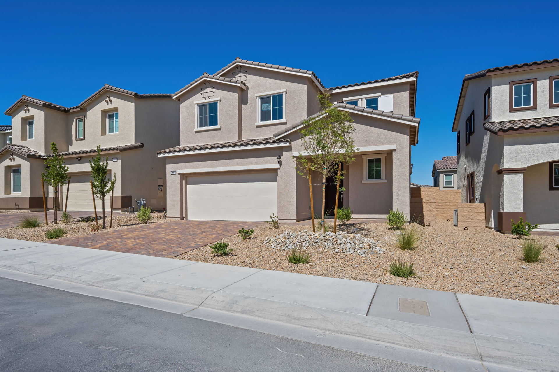 A large house with a driveway.