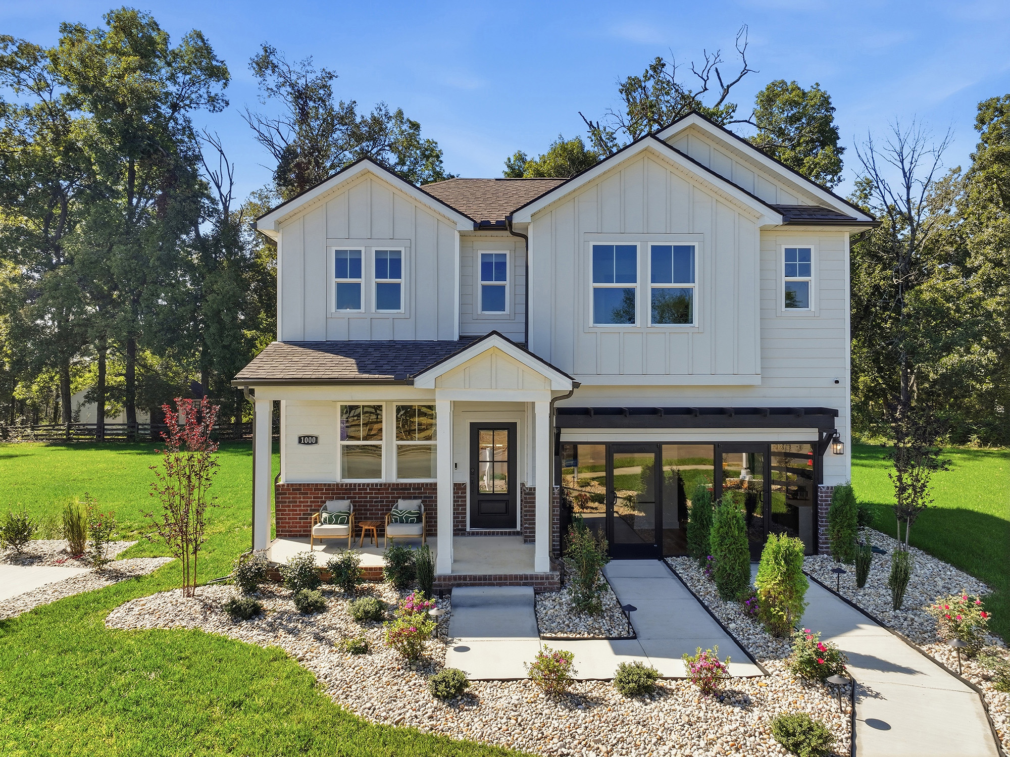 A house with a large front yard.
