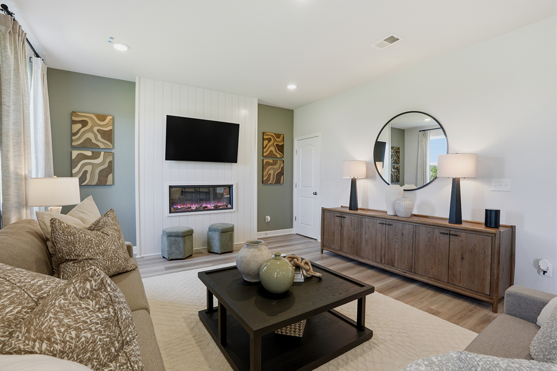 A living room with a fireplace.
