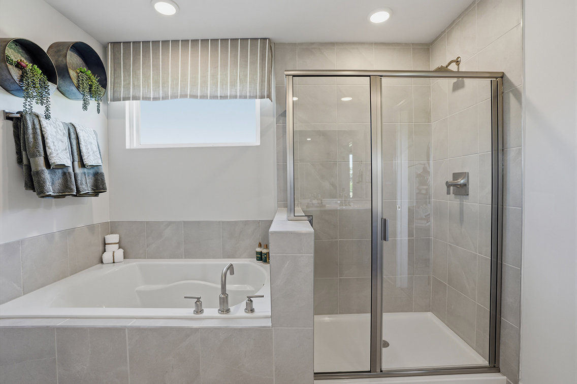 A bathroom with a glass shower.
