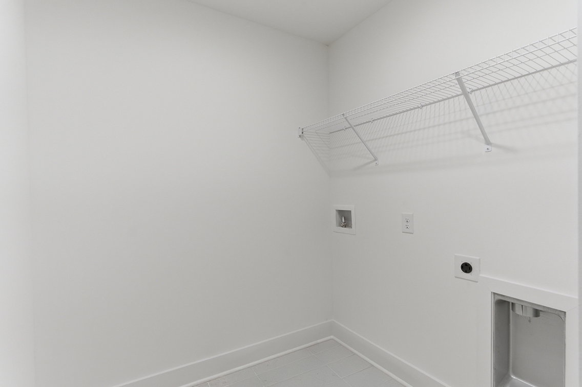 A white room with a vent and a vent.