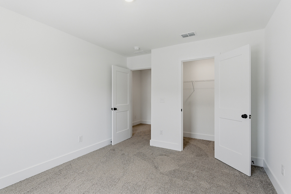 A room with white doors.