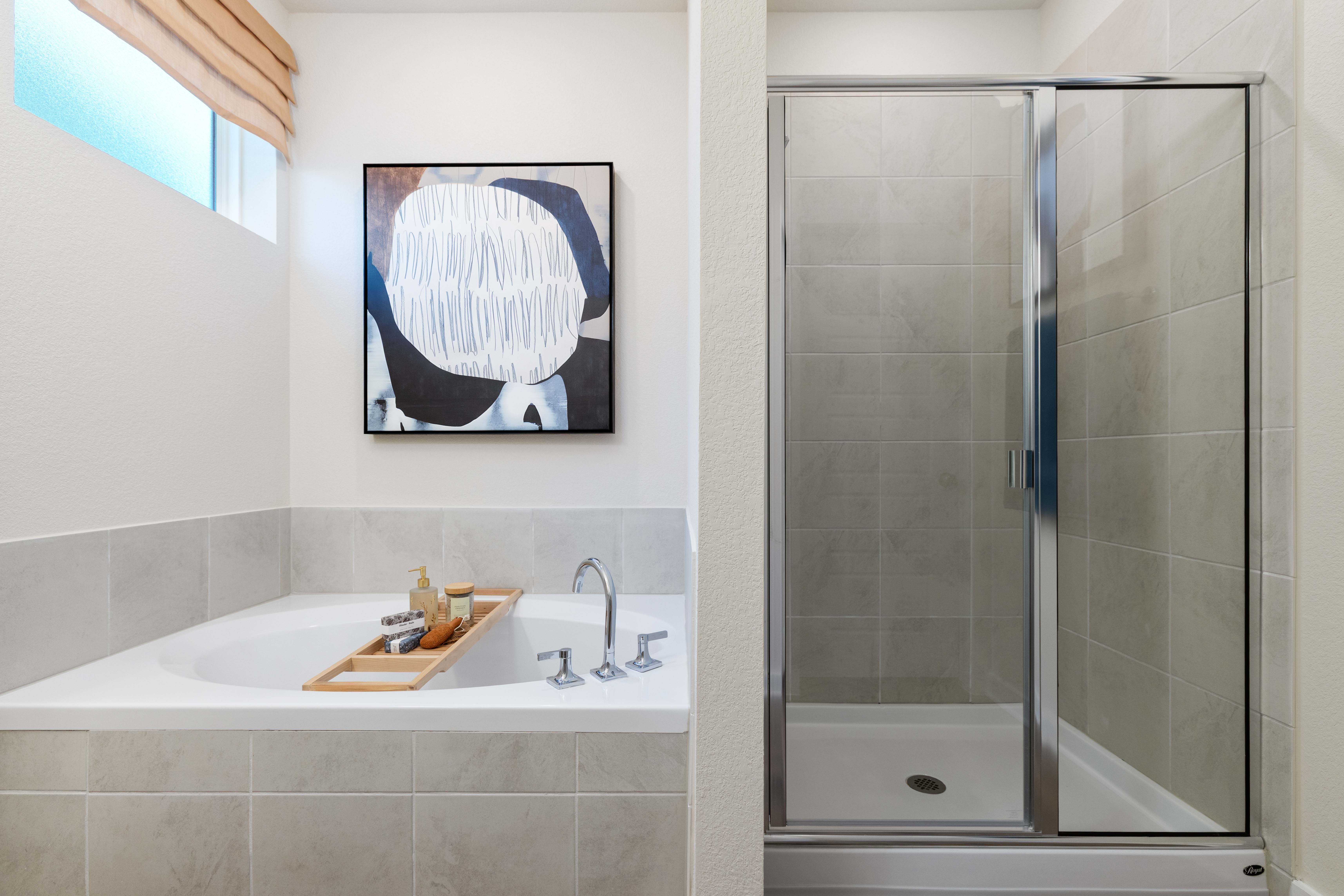 A bathroom with a glass shower.