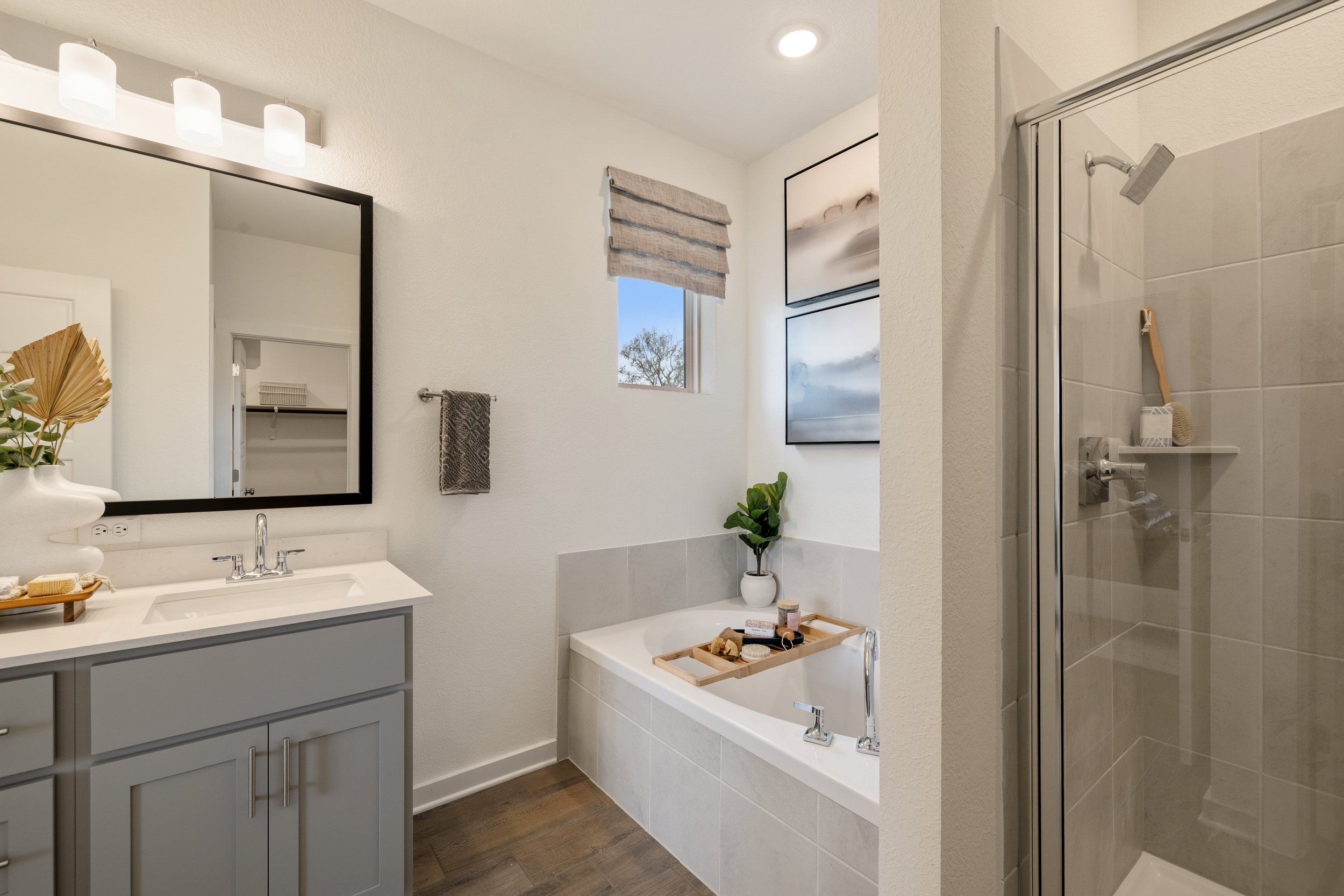 A bathroom with a glass shower.