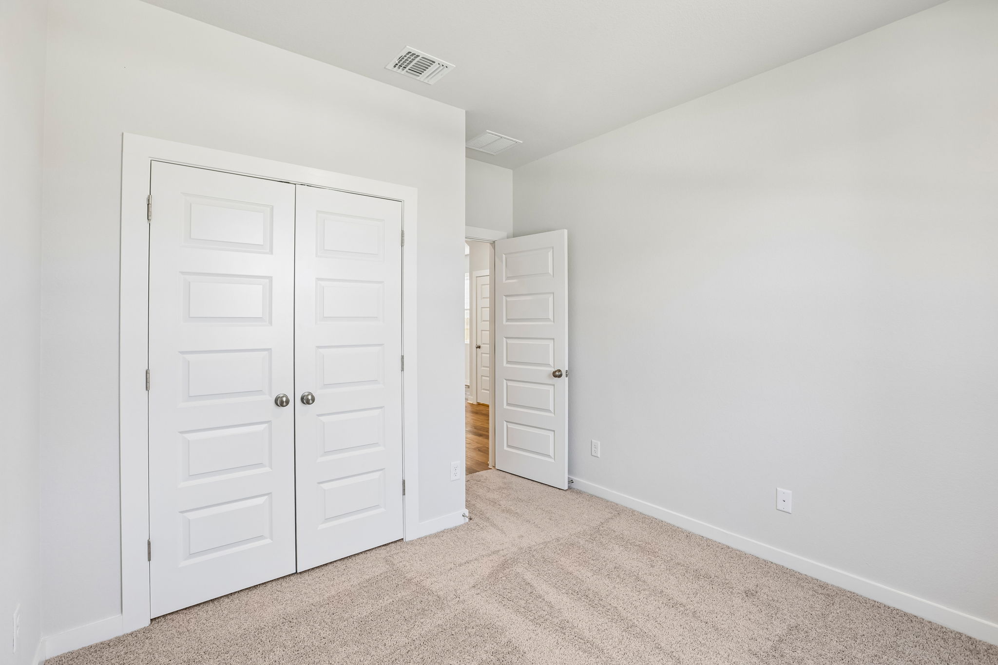 A room with white doors.