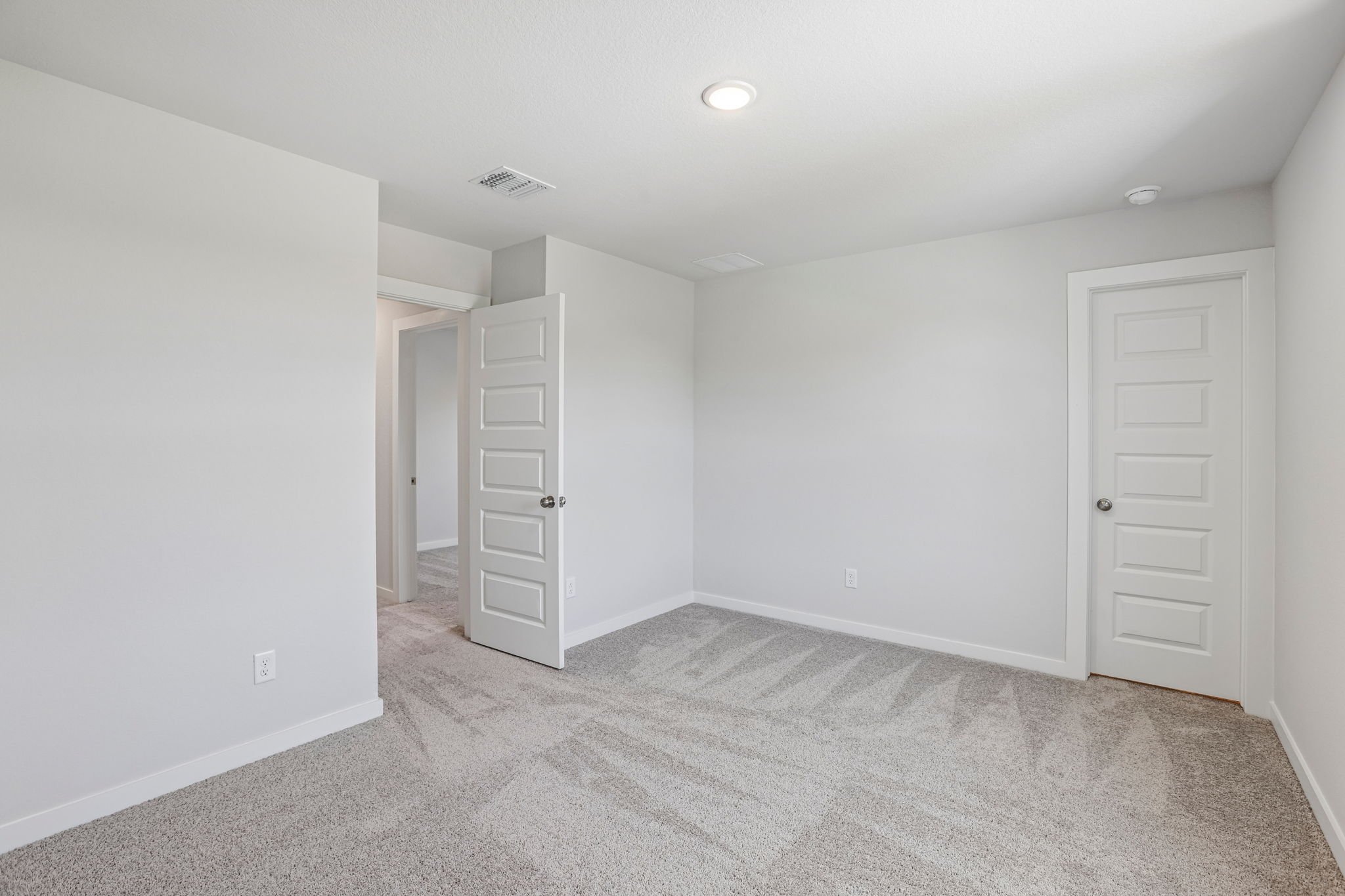 A room with white walls.