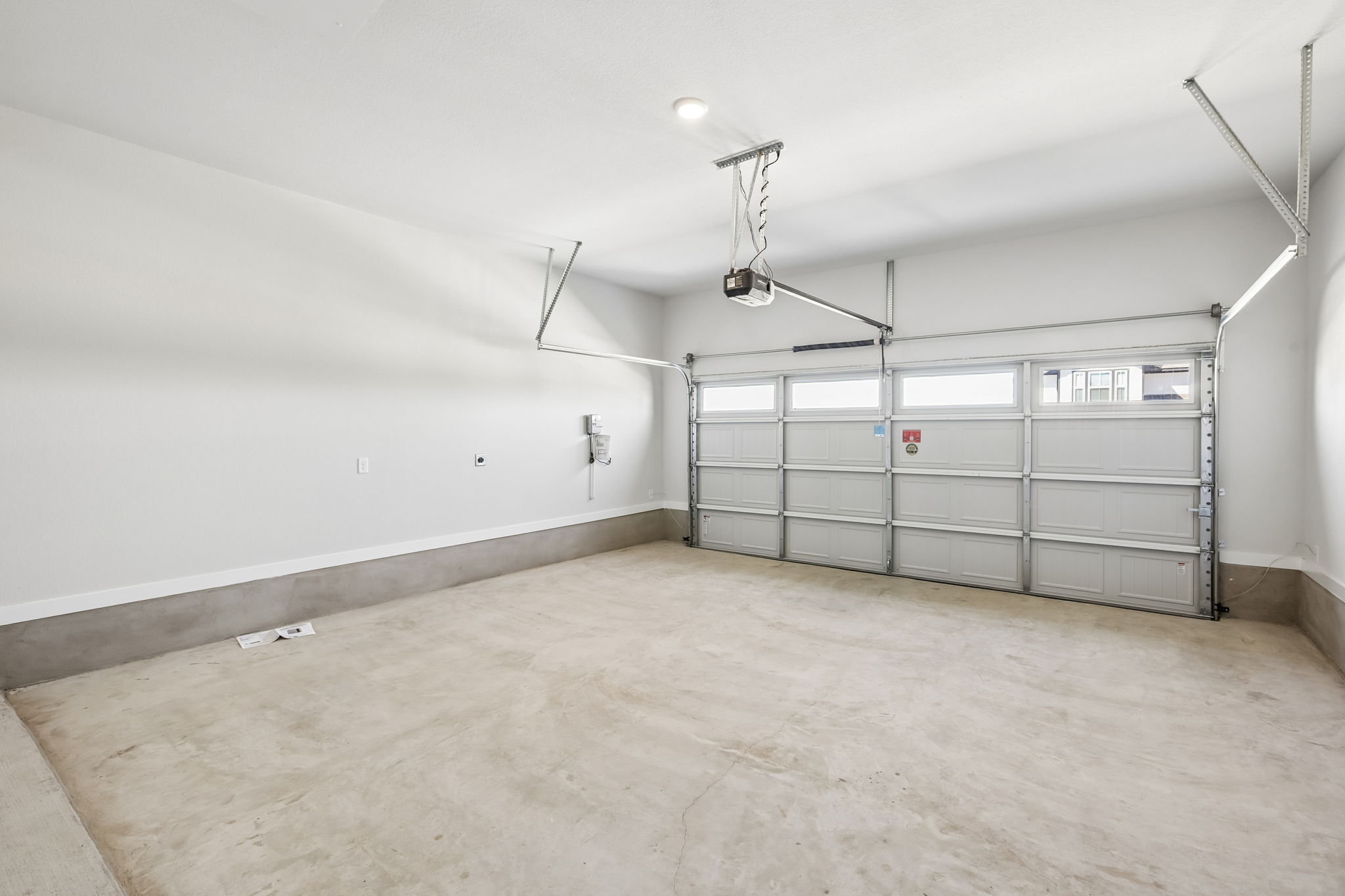 A room with a metal gate.