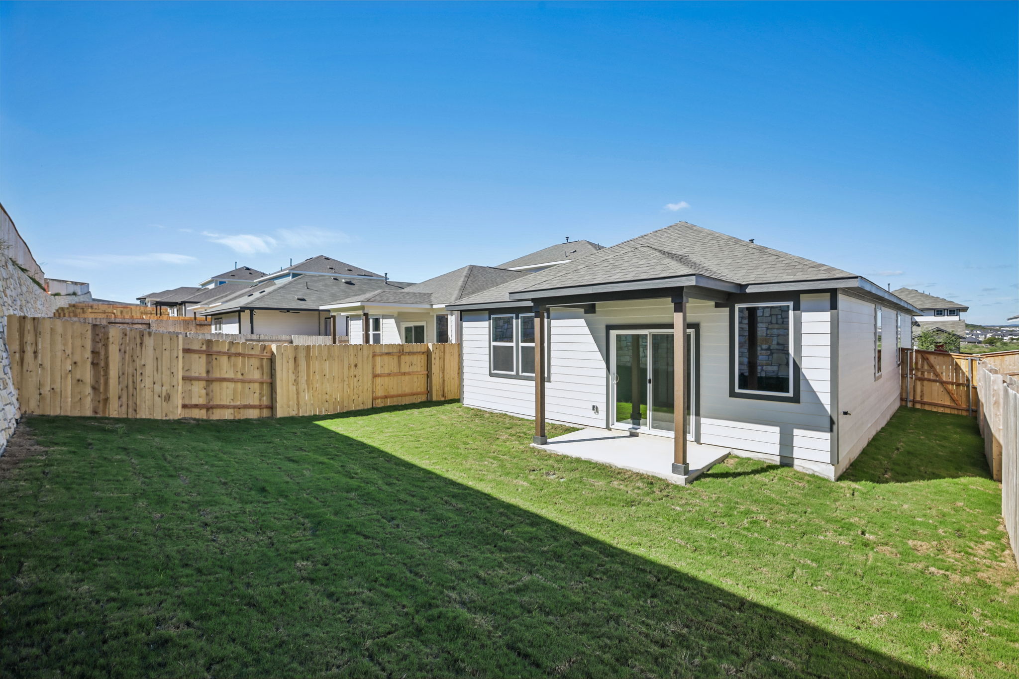 A house with a fence around it.